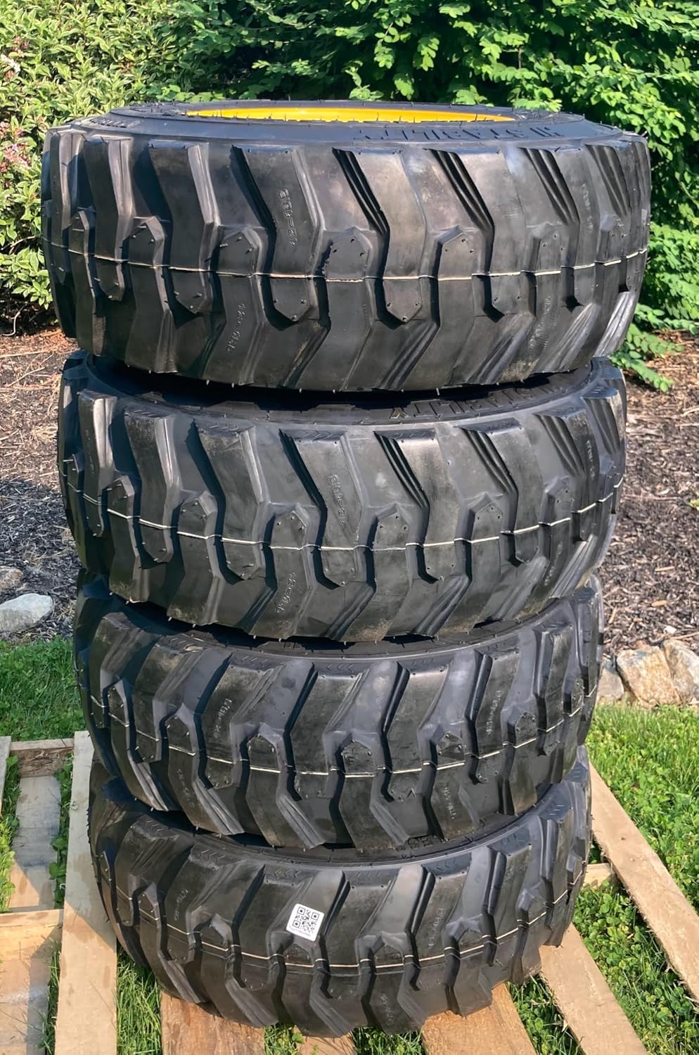 Set of 4-12-16.5 Forerunner SKS-1 Skid Steer Tires on Wheels/Rims (8 lug) for New Holland L175, L221, L223, L225, L230 & more -14PLY -12X16.5