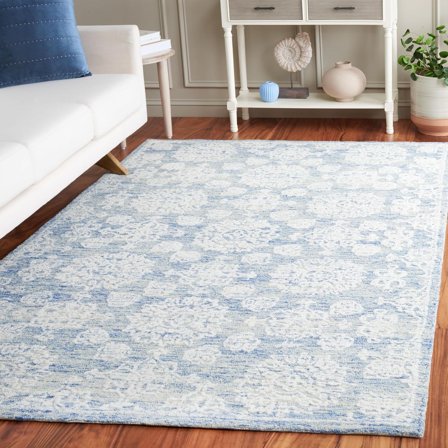 SAFAVIEH Ebony Collection Area Rug - 6' x 9', Ivory & Blue, French Country Floral Design, Handmade Wool, Ideal for The Living Room, Bedroom, Dining Room (EBN305M-6)