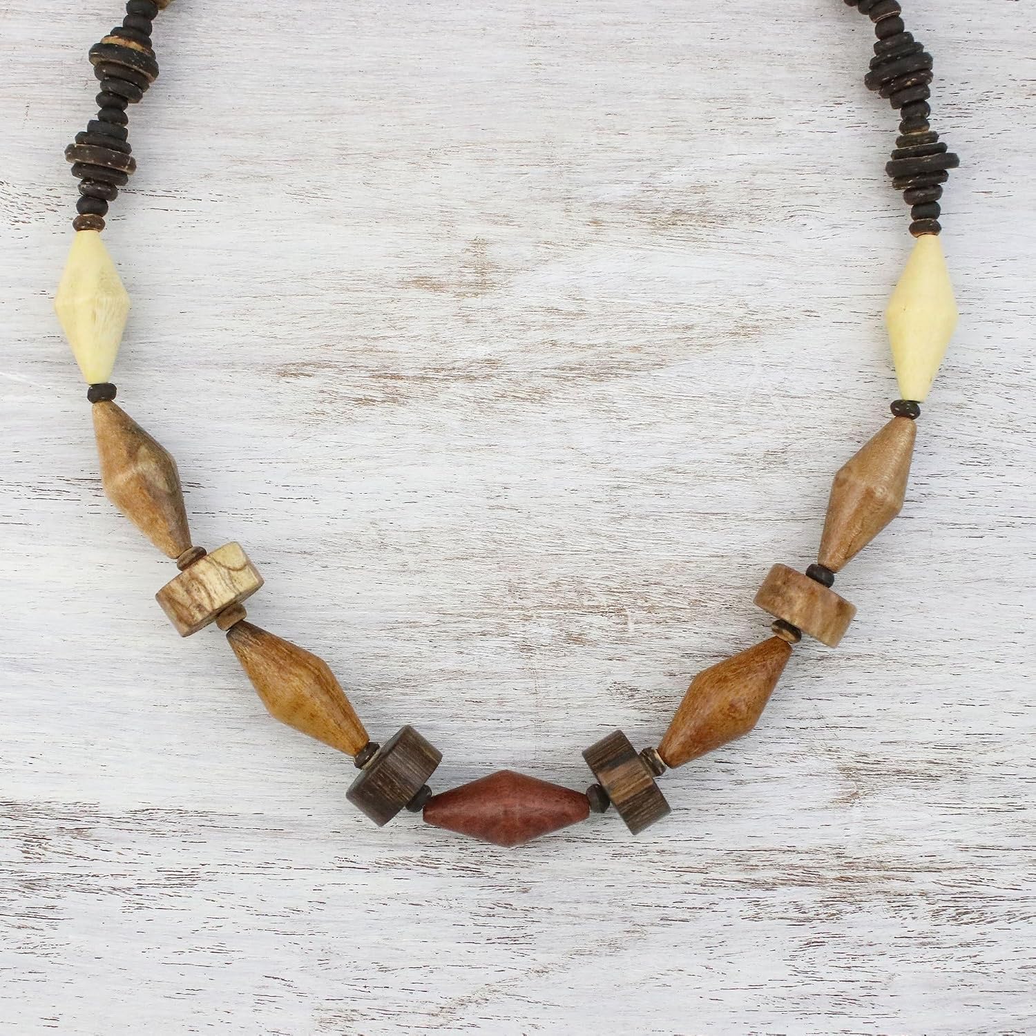 NOVICA Artisan Handmade Wood Coconut Shell Beaded Necklace Long from Thailand Brown Reclaimed [23.5 in min L x 31.5 in max L 14 mm W Pendant(s) 0.7 in L x 12.25 in W] ' Summer Traveler'