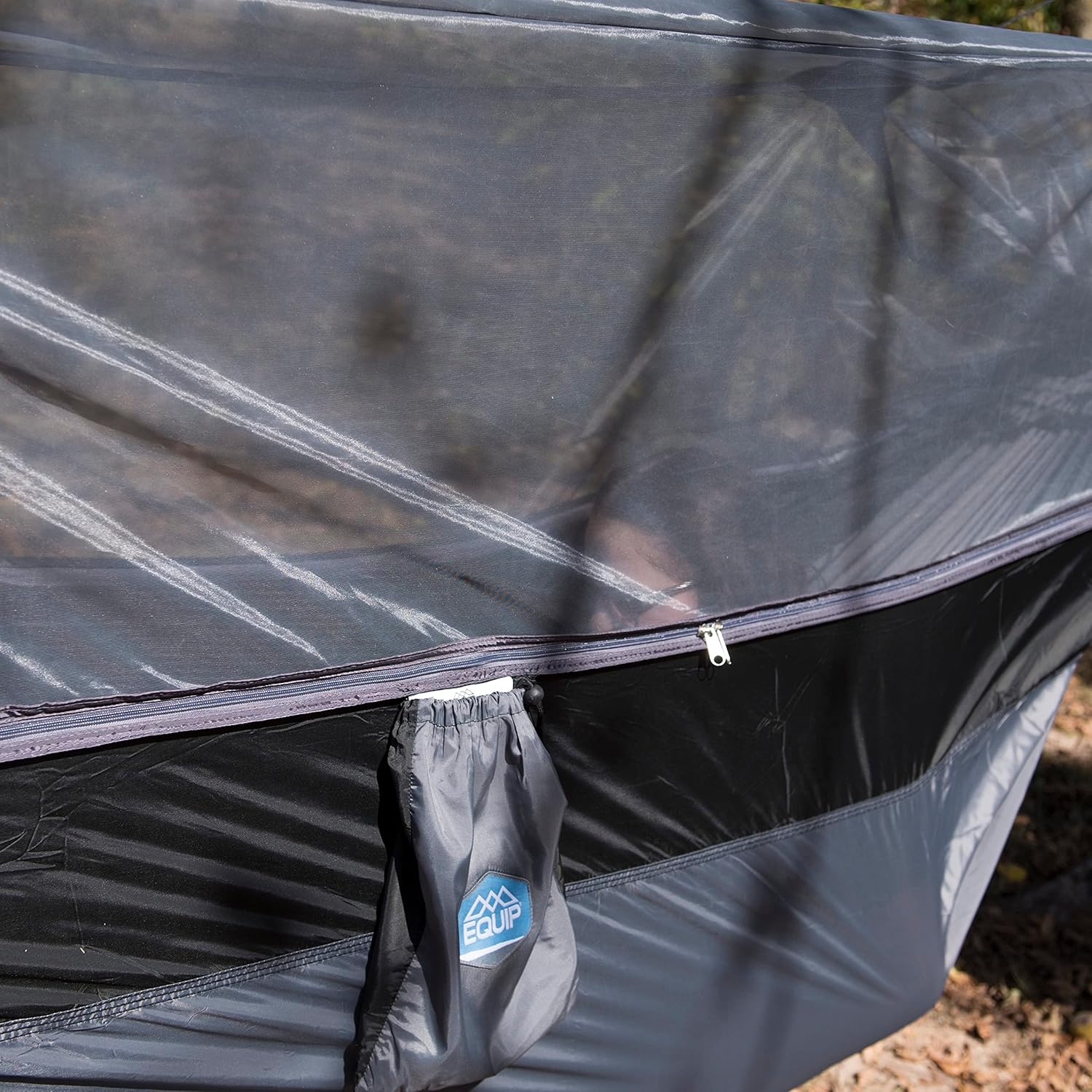 portable mosquito hammock setup showing hanging kit and bug net