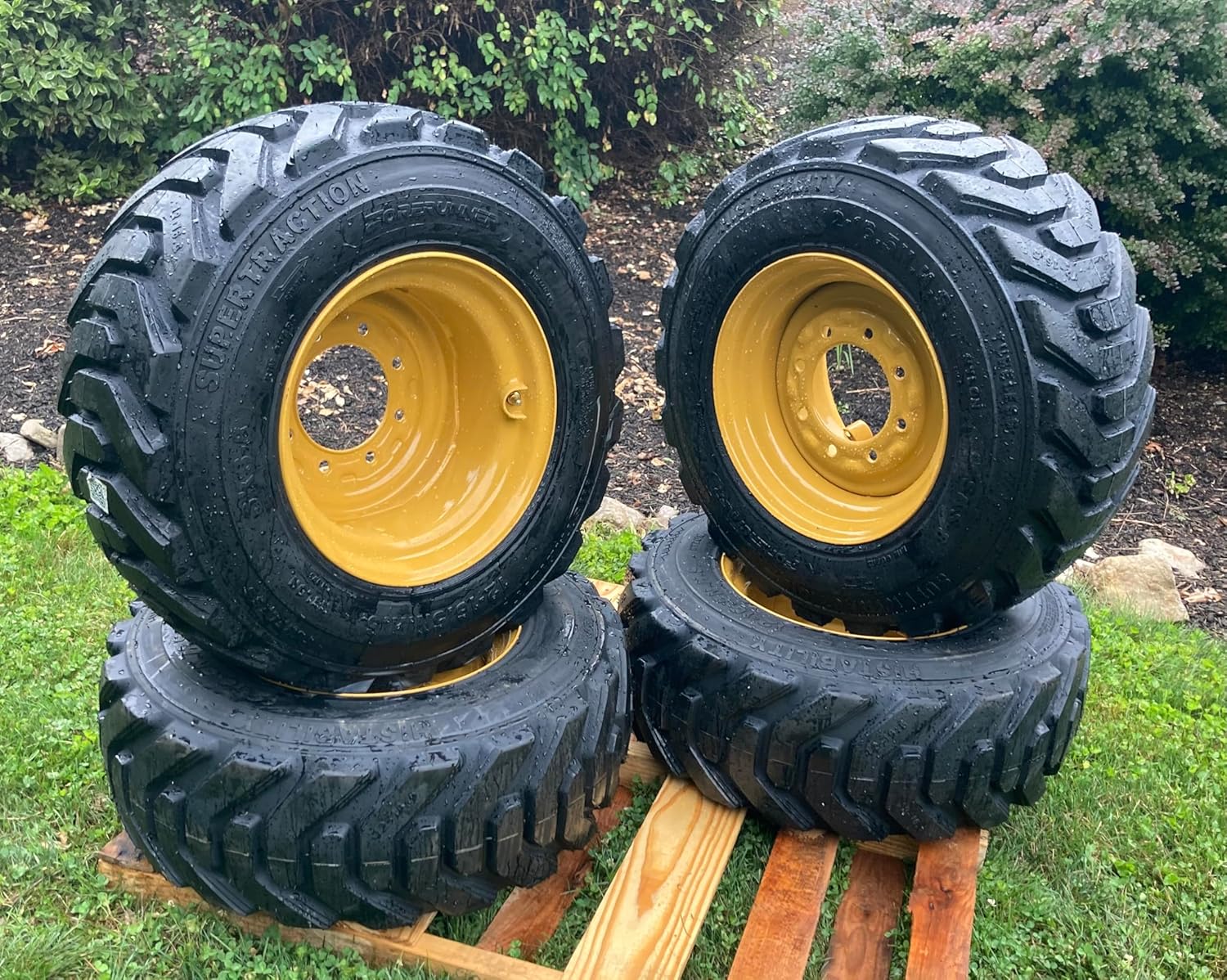 Set of 4-HD 12-16.5 Forerunner SKS-8 Skid Steer Tires on Wheels/Rims (8 lug) for Caterpillar -14PLY -12X16.5