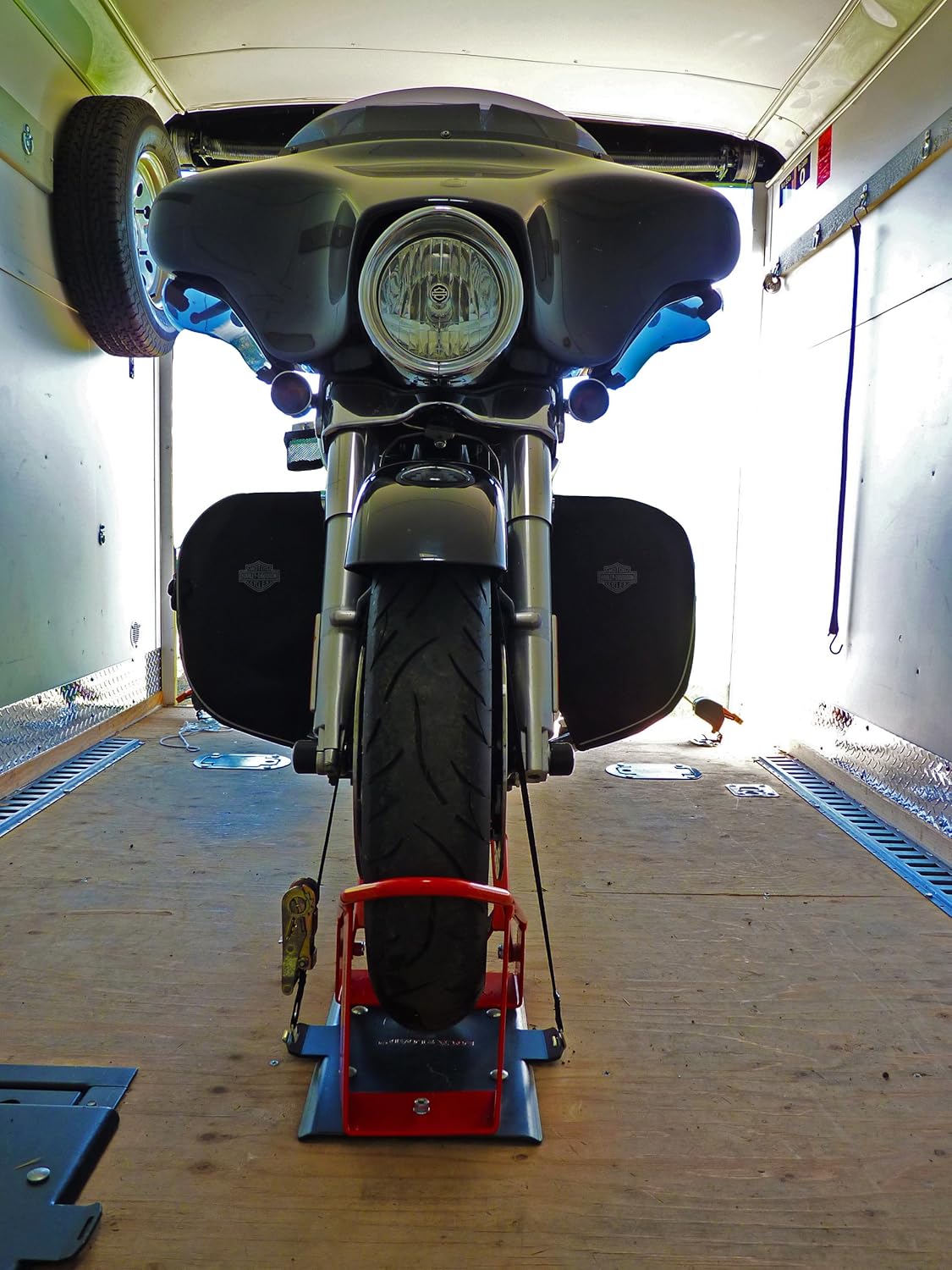 Motorcycle front wheel loaded into chock