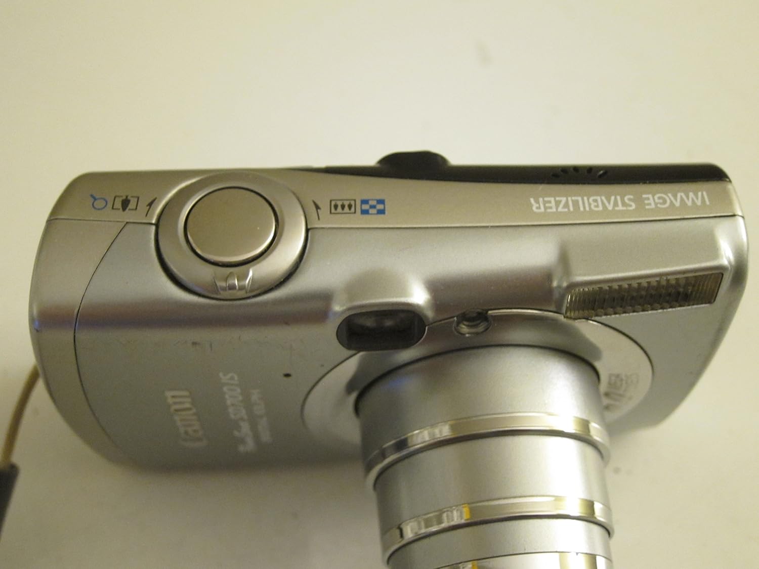 Top view of Canon PowerShot SD700 IS showing power button and shutter button