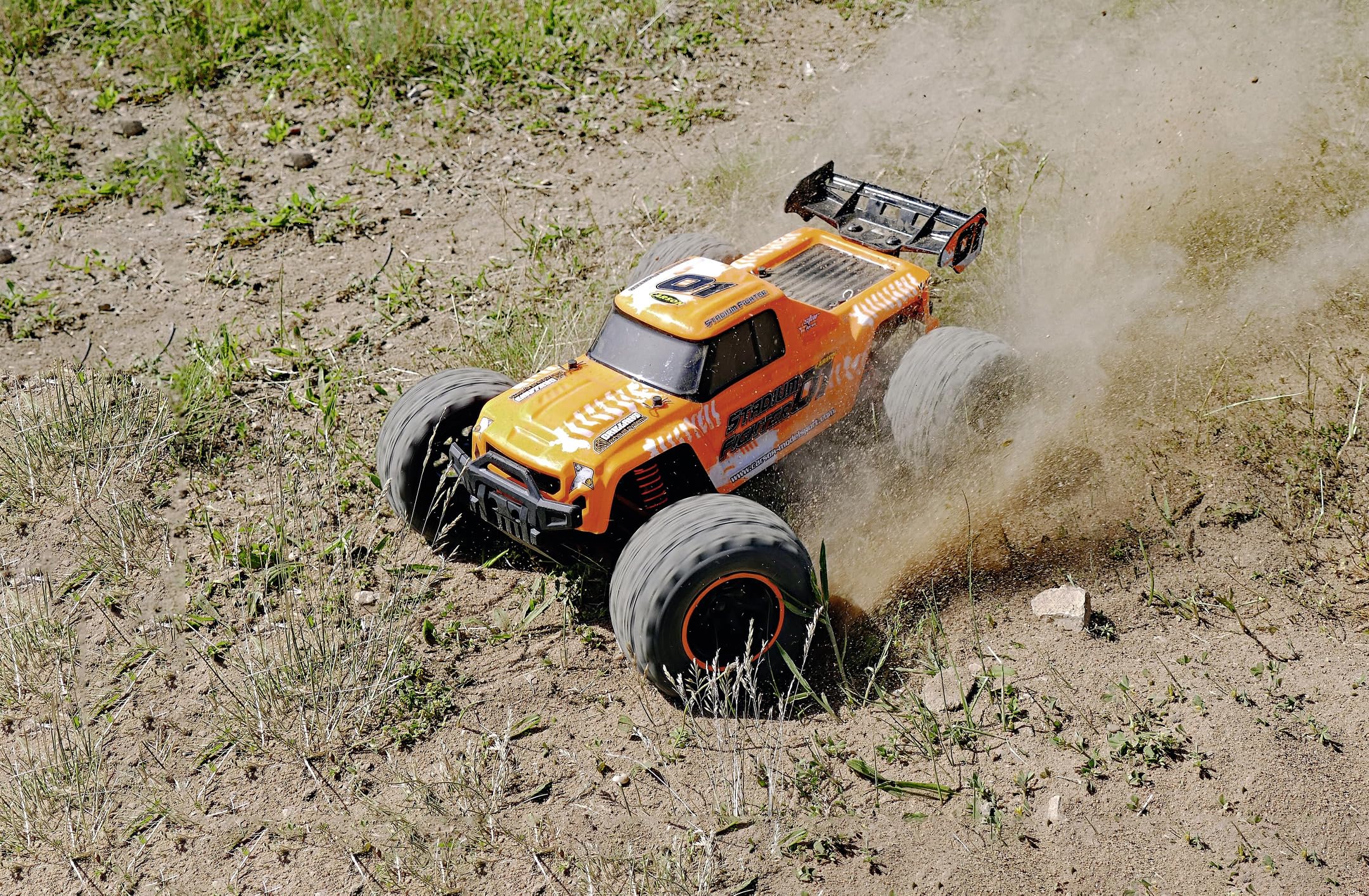 Carson 500404253 1:10 XS Stadium Fighter 100% RTR Naranja - Coche teledirigido, Buggy con radiocontrol, Incl. Pilas y Mando a Distancia, Buggy Todoterreno
