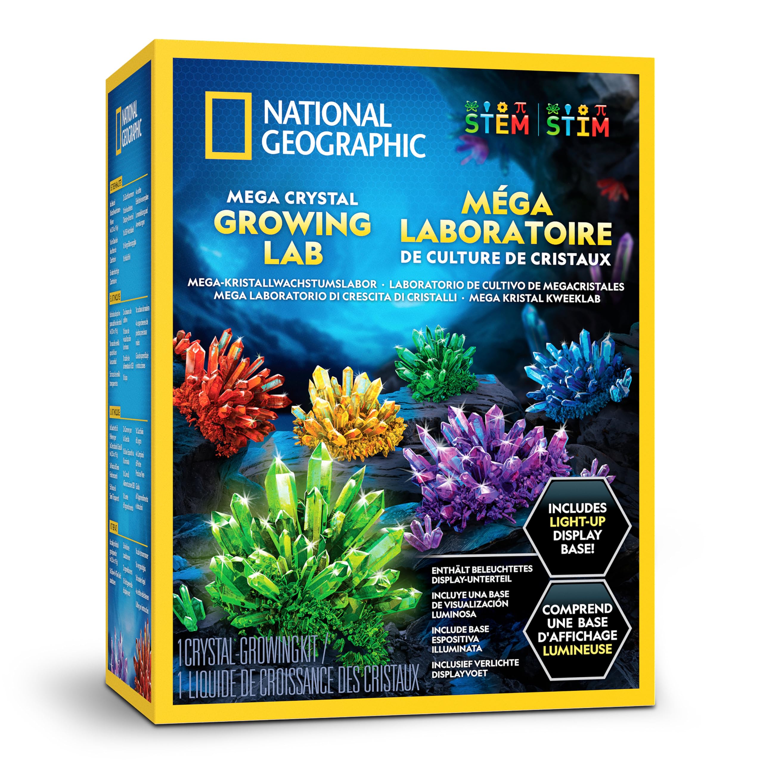 Six colorful grown crystals displayed on a light-up stand