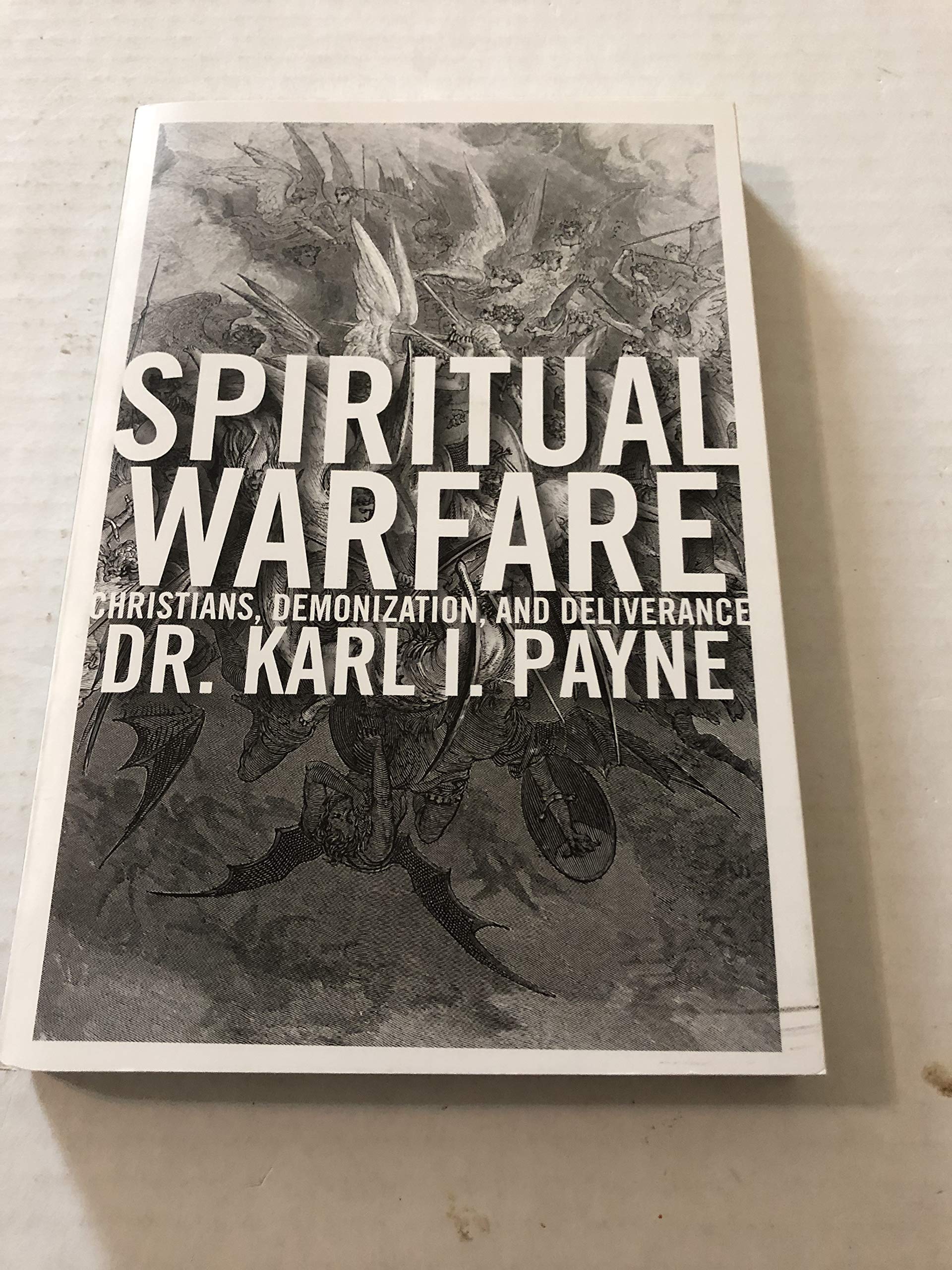 Spiritual Warfare: Christians, Demonization and Deliverance Paperback – October 4, 2011