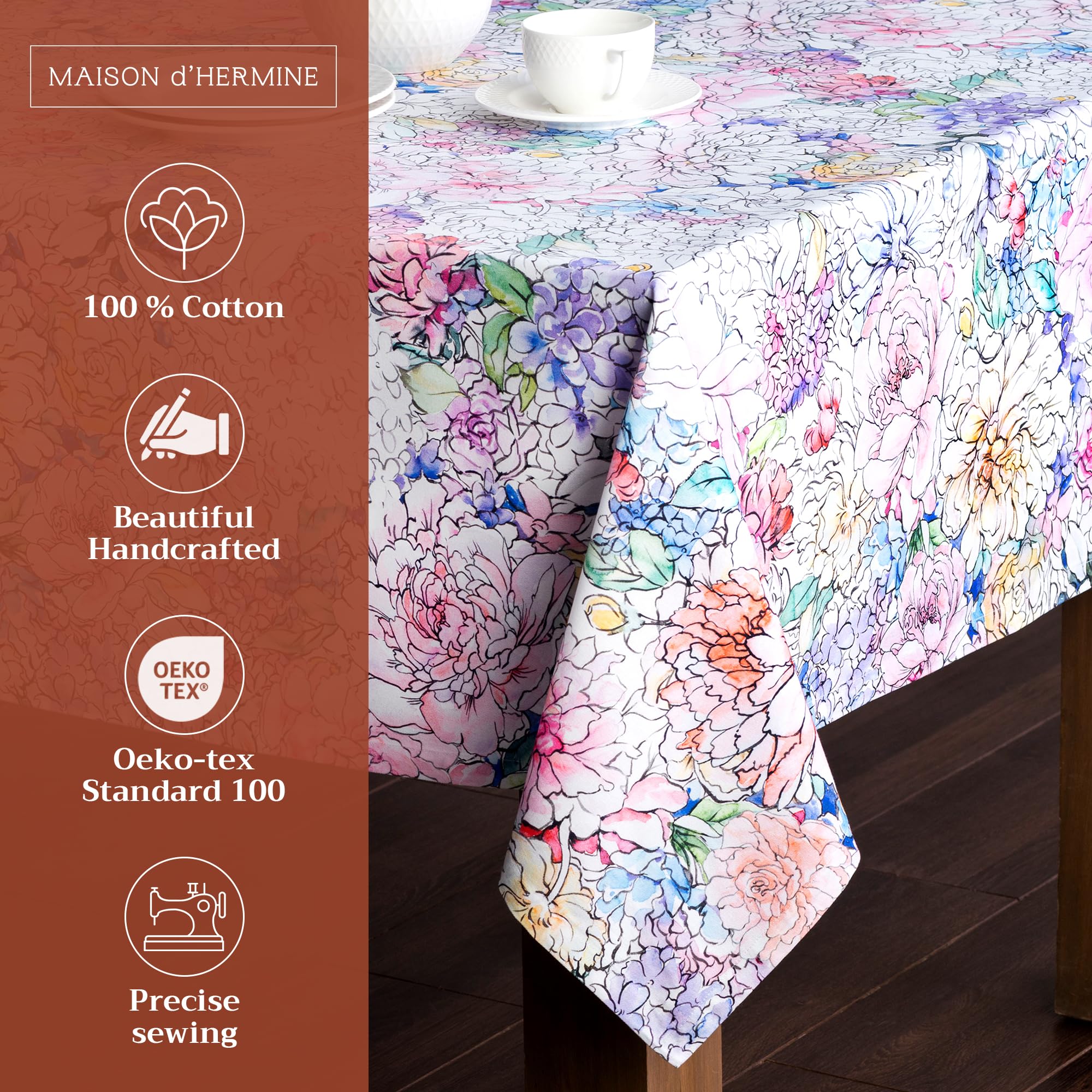 The Maison d' Hermine Floral Love 100% Cotton Tablecloth adds a touch of European charm to a dining setting.