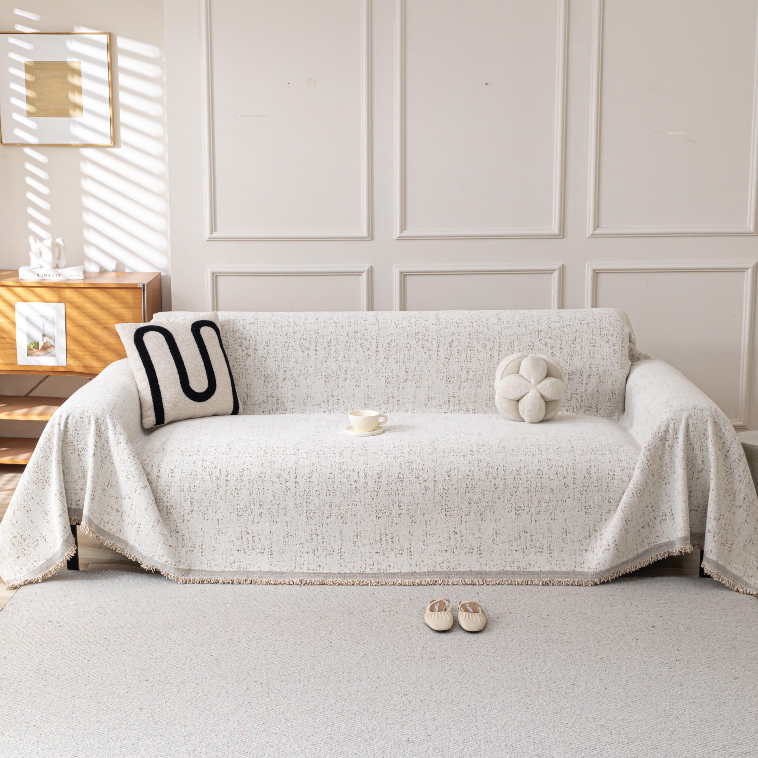 Photo 1 of KaviKon Couch Cover for Dogs, Boho Sofa Covers for 3 Cushion Couch, Chenille Slipcover for Pets Washable, L-Shape Sectional Couch Loveseat Cover Soft Throw Blankets with Tassels(91x150,Speckled Beige)