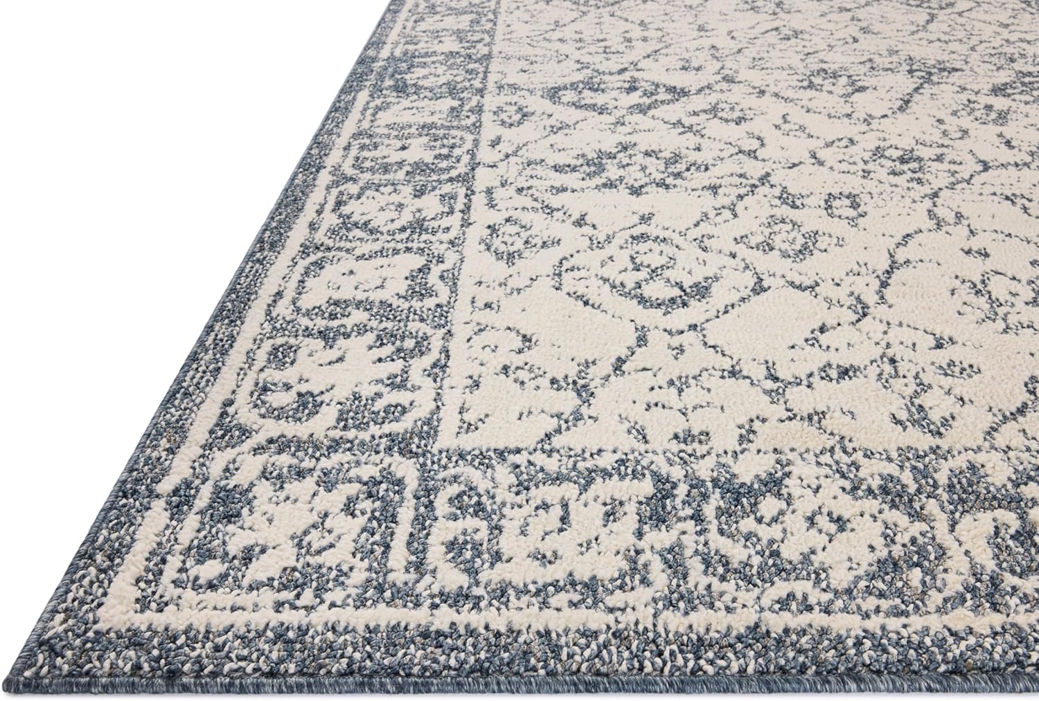 Ivory and Blue Rectangular Synthetic Area Rug 6'7" x 9'2"