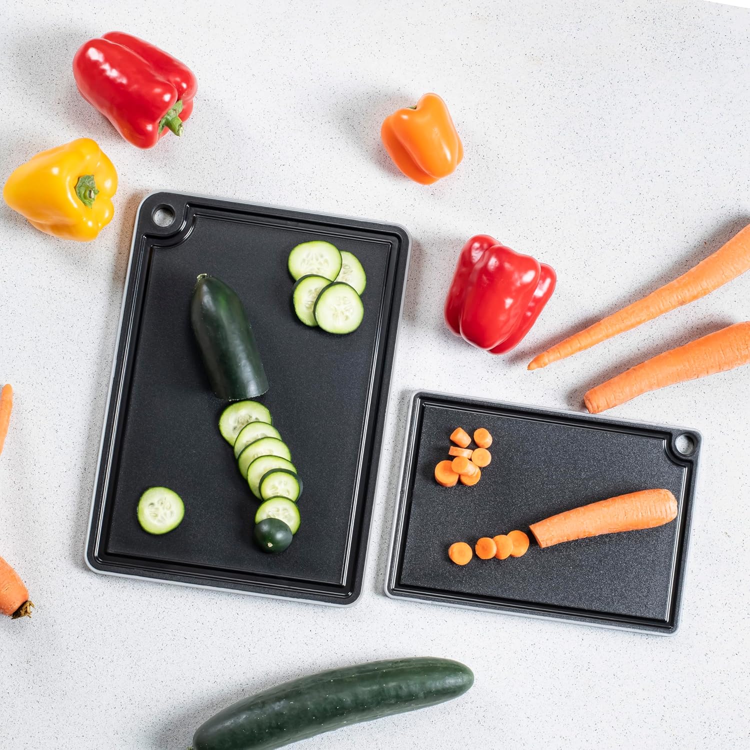 Linden Sweden - Mimi Cutting Board Set of 2 - Made in Sweden - Plastic Cutting Boards for Kitchen - BPA Free & Dishwasher Safe - Black Cutting Board - 10 5/8" x 7 1/2" x 3/8" & 13 3/4" x 9" x 3/8"
