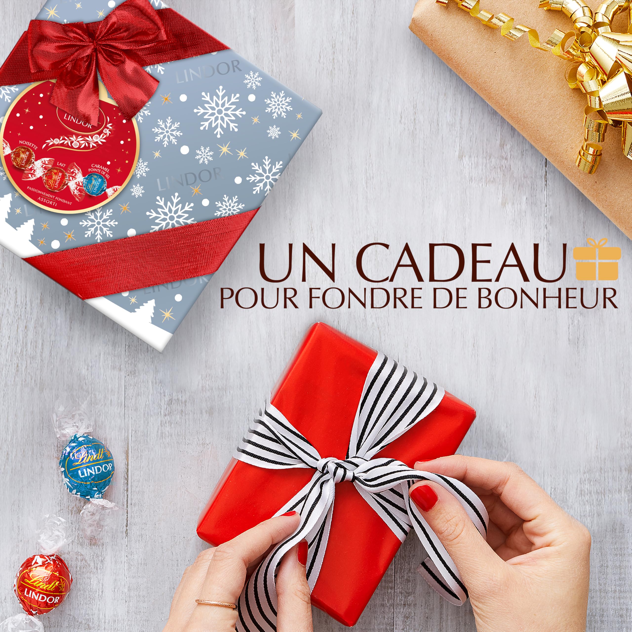 Lindt - Boîte Cadeau LINDOR - Assortiment de Chocolats au Lait, Noisettes, Caramel Pointe de Sel - Cœur fondant - Idéal pour Noël, 287g