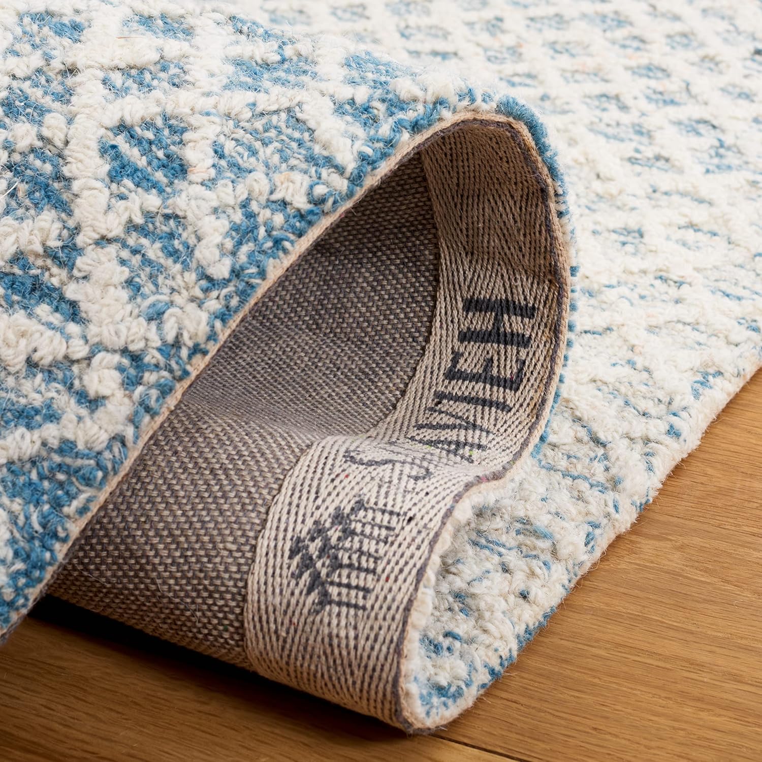 Ivory and Blue Hand-Tufted Wool Area Rug, 5' x 8'