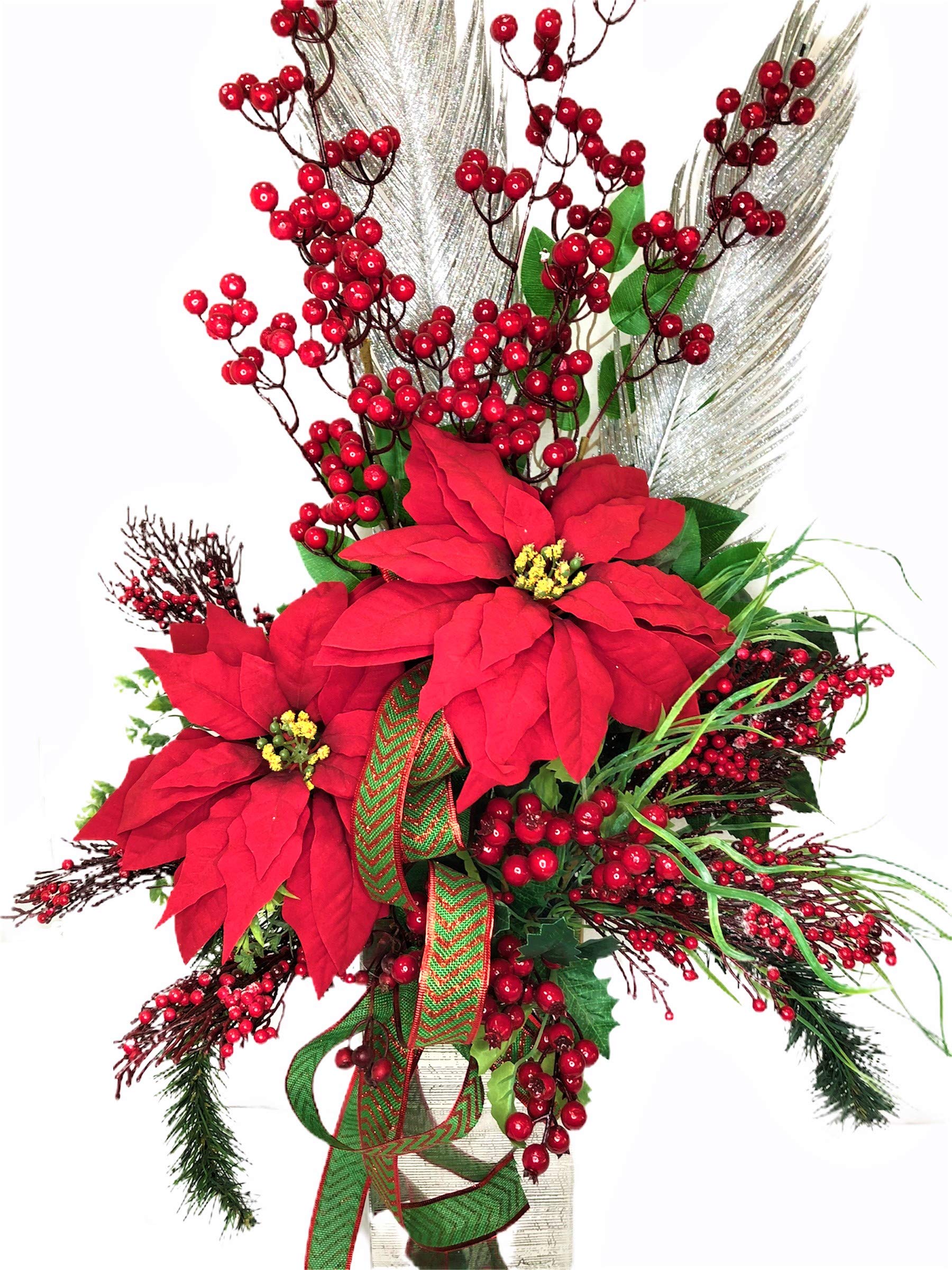 LBA Centro Floral navideño. Elaborado en un florero metálico, con Flores secas y Artificiales. Medidas aproximadas totales: 100x55x25 cms.