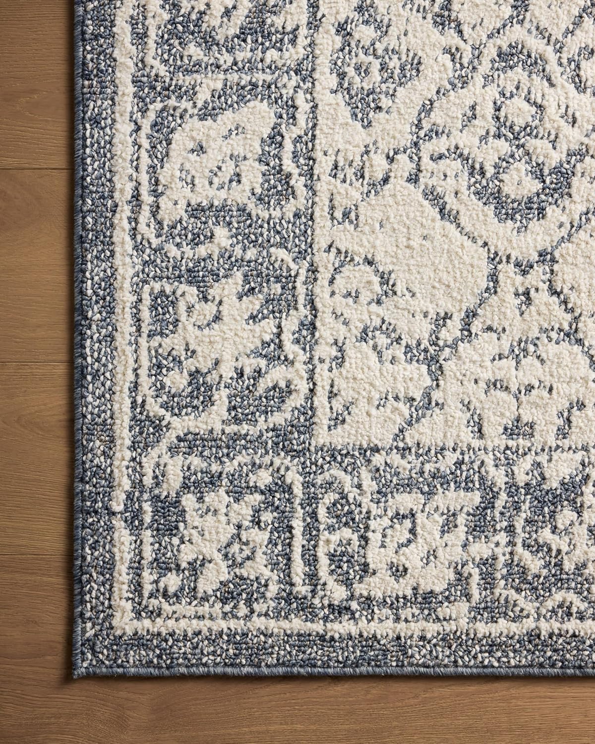 Ivory and Blue Rectangular Synthetic Area Rug 6'7" x 9'2"