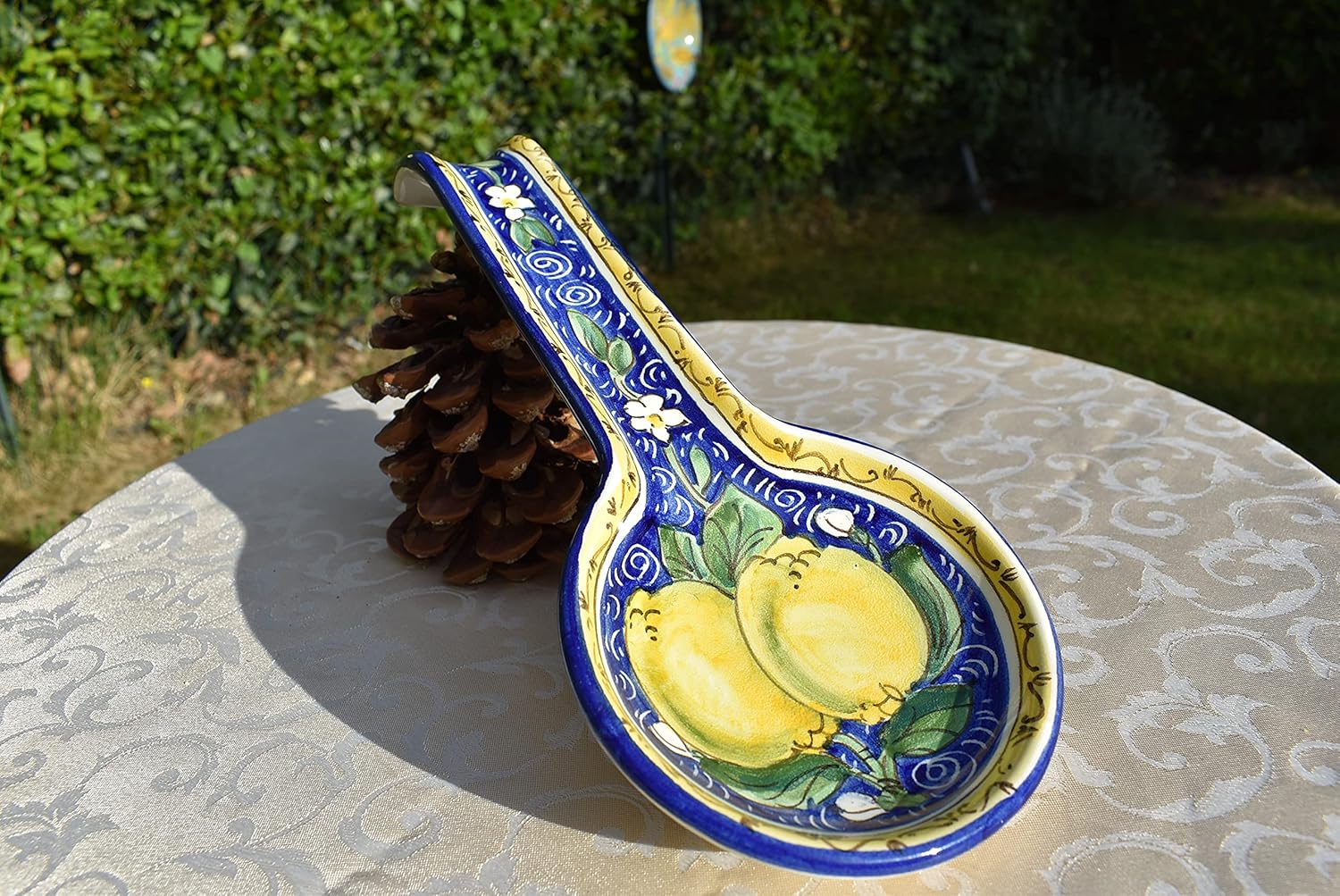 Ceramic handmade and hand-painted ceramic spoon rest is decorated in traditional Tuscan pattern made in Italy