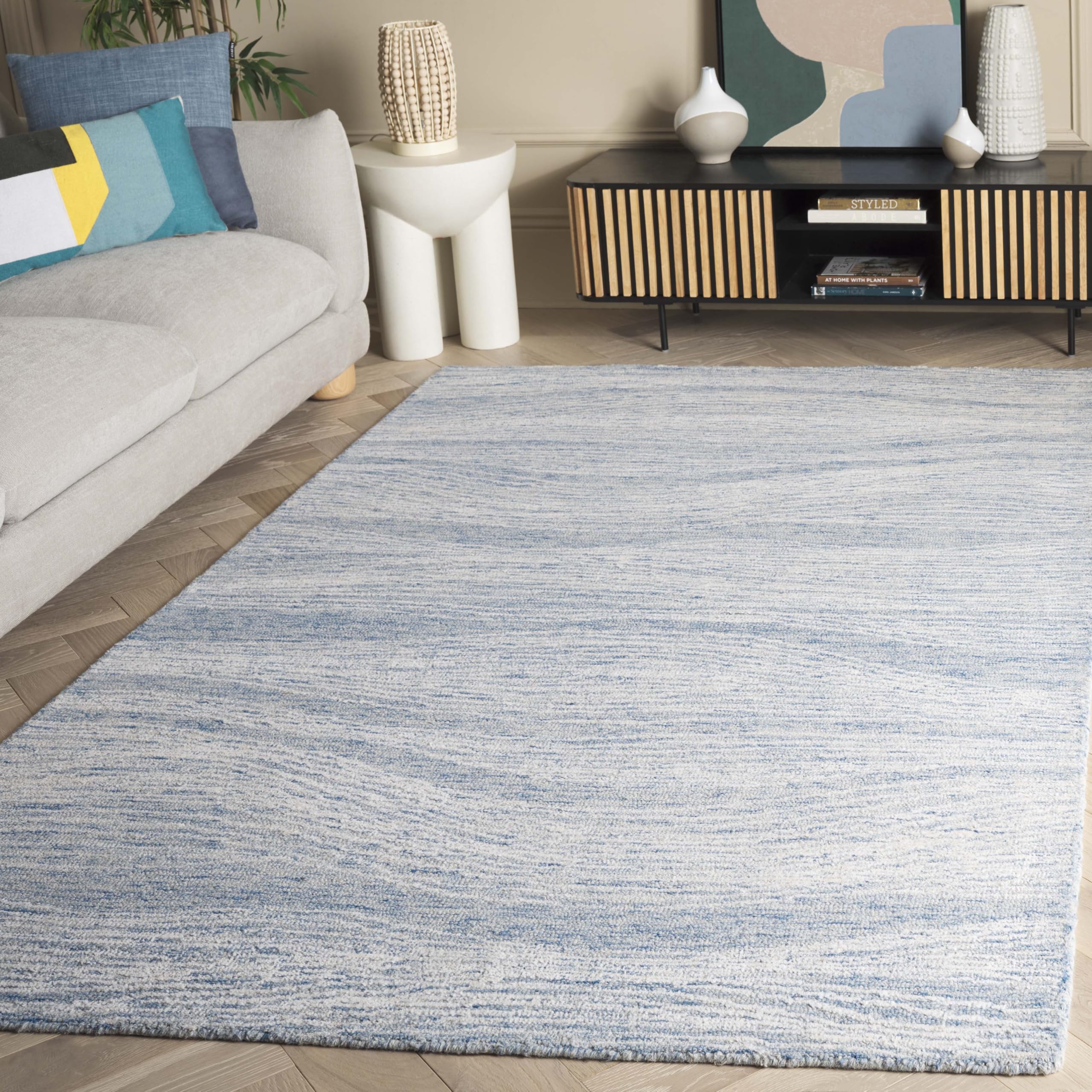 Tapis géométrique bleu et ivoire à poil court Metro Safavieh 122x183