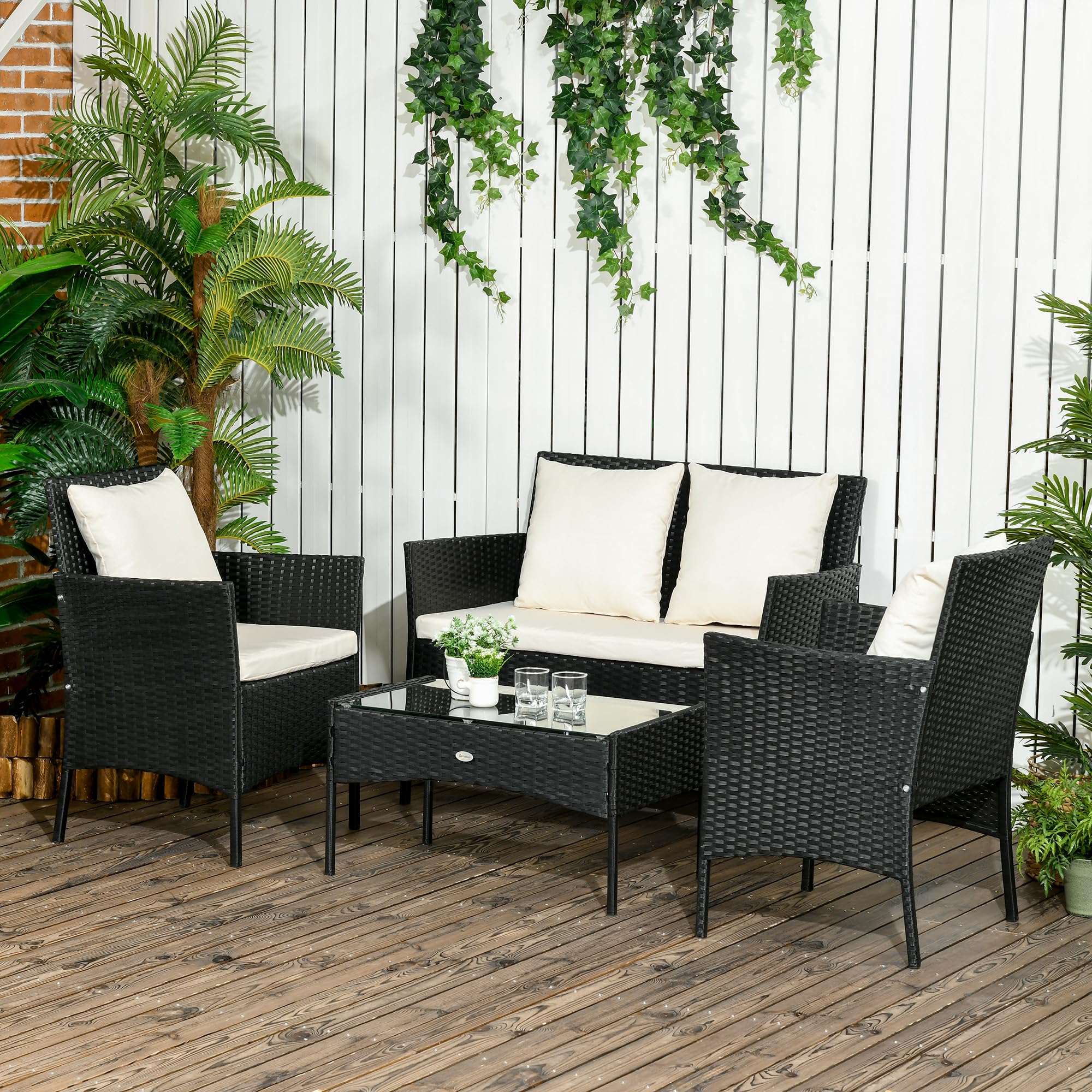 Outsunny Conjunto de Jardín Exterior de Ratán Sintético Juego de 4 Piezas Muebles de Jardín con Sofá de 2 Plazas 2 Sillones 1 Mesa de Centro con Encimera de Vidrio Templado y Cojines Crema y Negro