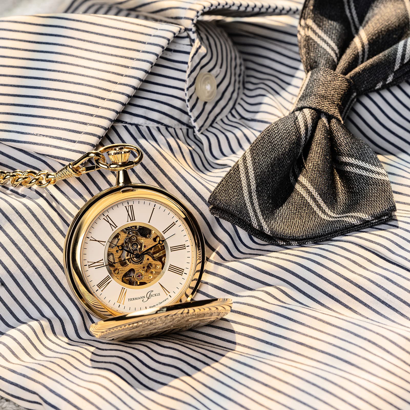 Hermann Jäckle Herren Taschenuhr Wien Vergoldet Skelett 50 mm | Made in Germany, vergoldetes Gehäuse, Handaufzugswerk, römische Ziffern, inklusive Kette und Reiseetui.