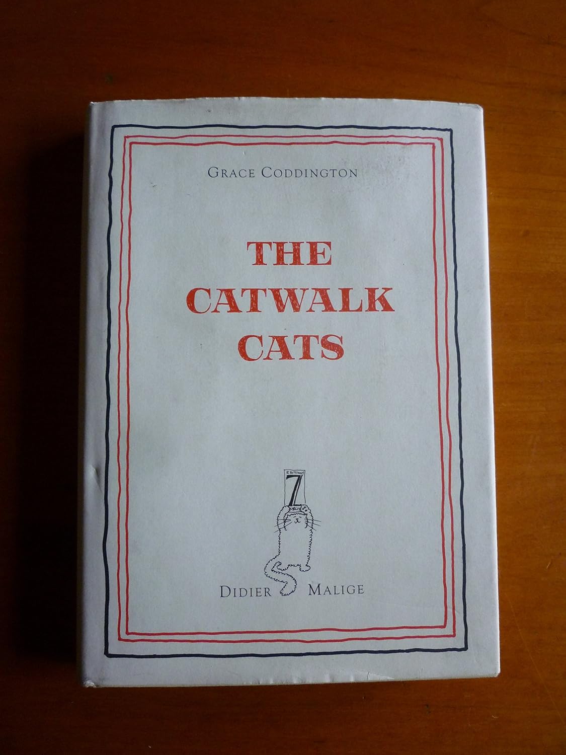 The Catwalk Cats      Hardcover – December 1, 2006