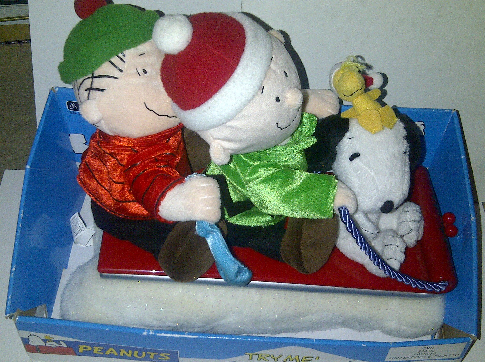 Buy Gemmy Peanuts Snoopy Linus & Charlie Brown on Sled Musical Online