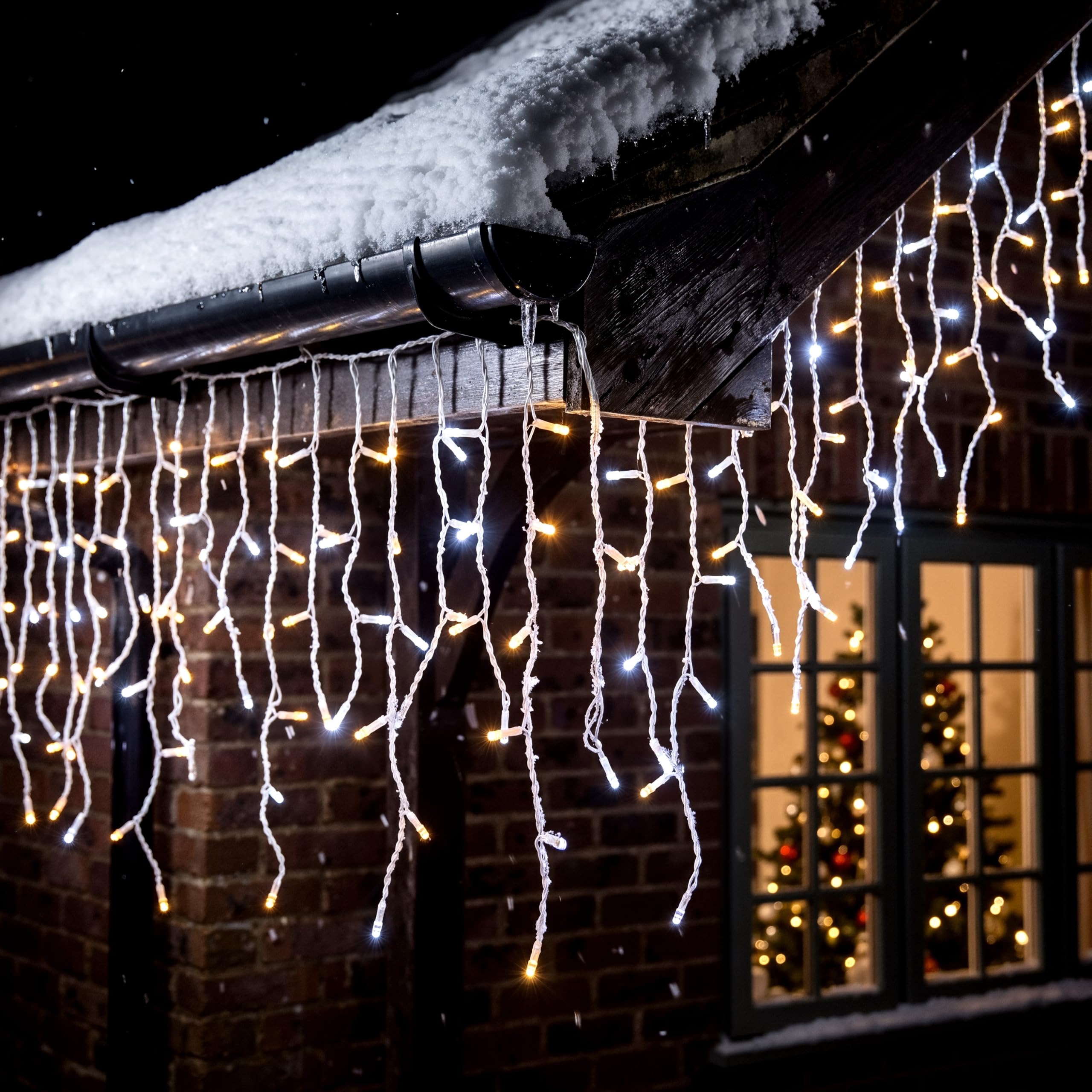 The Magic Toy Shop 200 LED Warm White & White Icicle Christmas Lights, 4.4m | Battery operated waterproof casing. Indoor & outdoor use with clear wire & 8 modes. Automatic 8 hour timer saves power.