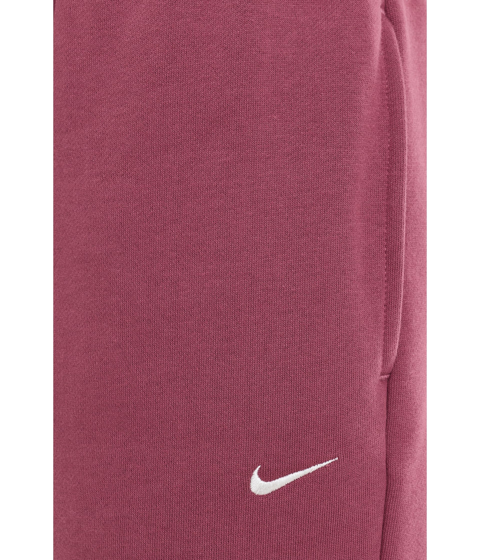 Nike IM8074 Studio Fleece spodnie oversize z materiału średniej grubości z wysokim ściągaczem i ściągaczami dla kobiet