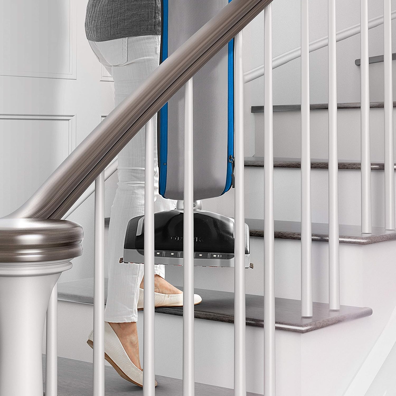 Woman Using Oreck Swivel Vacuum on Stairs
