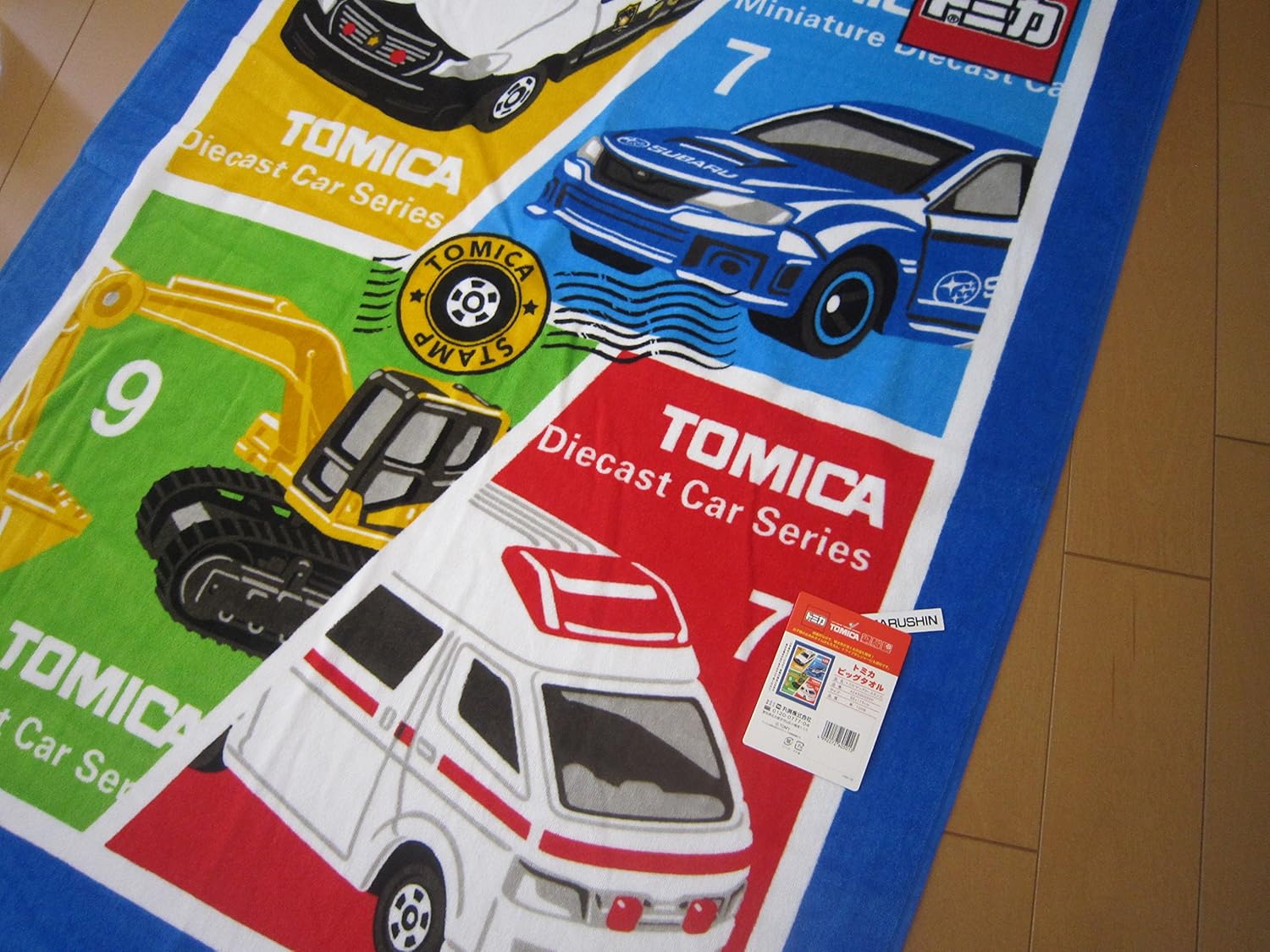 Amazon Co Jp マルシン 17年柄 トミカ ｔｏｍｉｃａ ビッグカースタンプ お昼寝ケット タオルケット ホーム キッチン