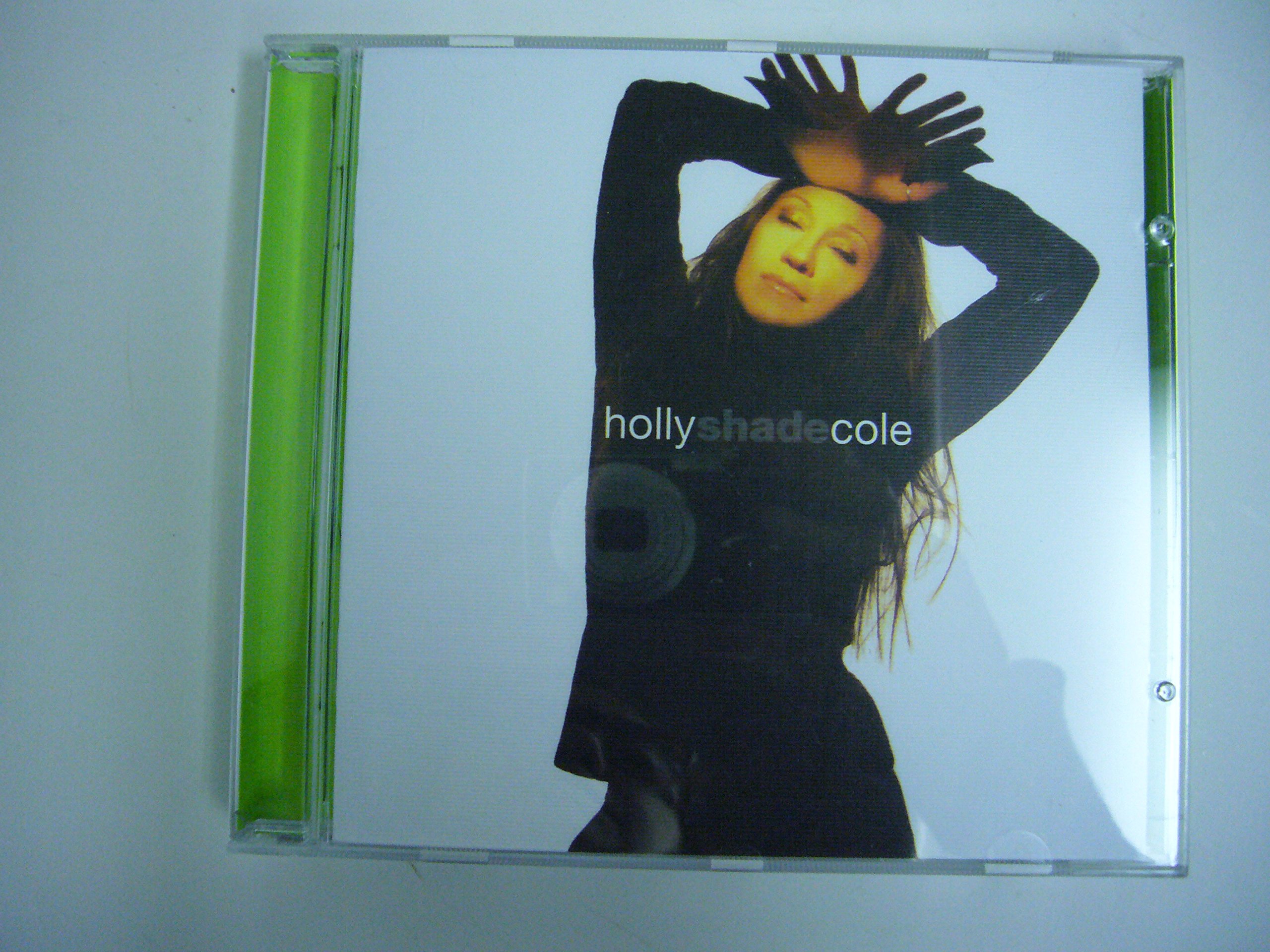 Shade [Audio CD] Holly Cole; Irving Mills; Jerome Moross; Oscar Hammerstein II; Cole Porter; Will Hudson; Frederick Loewe; Brian Holland; Brian Wilson; Lionel Hampton; Larry Conley; Lamont Dozier; Sonny Burke; Billy Barnes; Eddie Holland and Richard Rodgers
