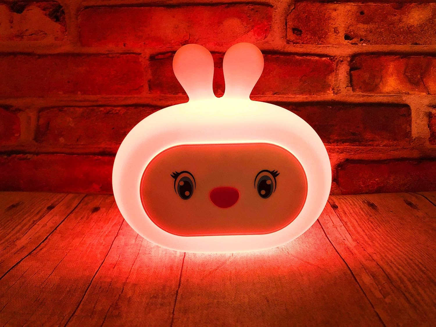 Sleepytime Baby Bunny Toddler Night Light Sleep Soother Sound Machine. 8 Different Changeable Colors and 5 Different Soothing Sounds. Chargeable Battery Lasts 48 Hours and USB Cable Included.