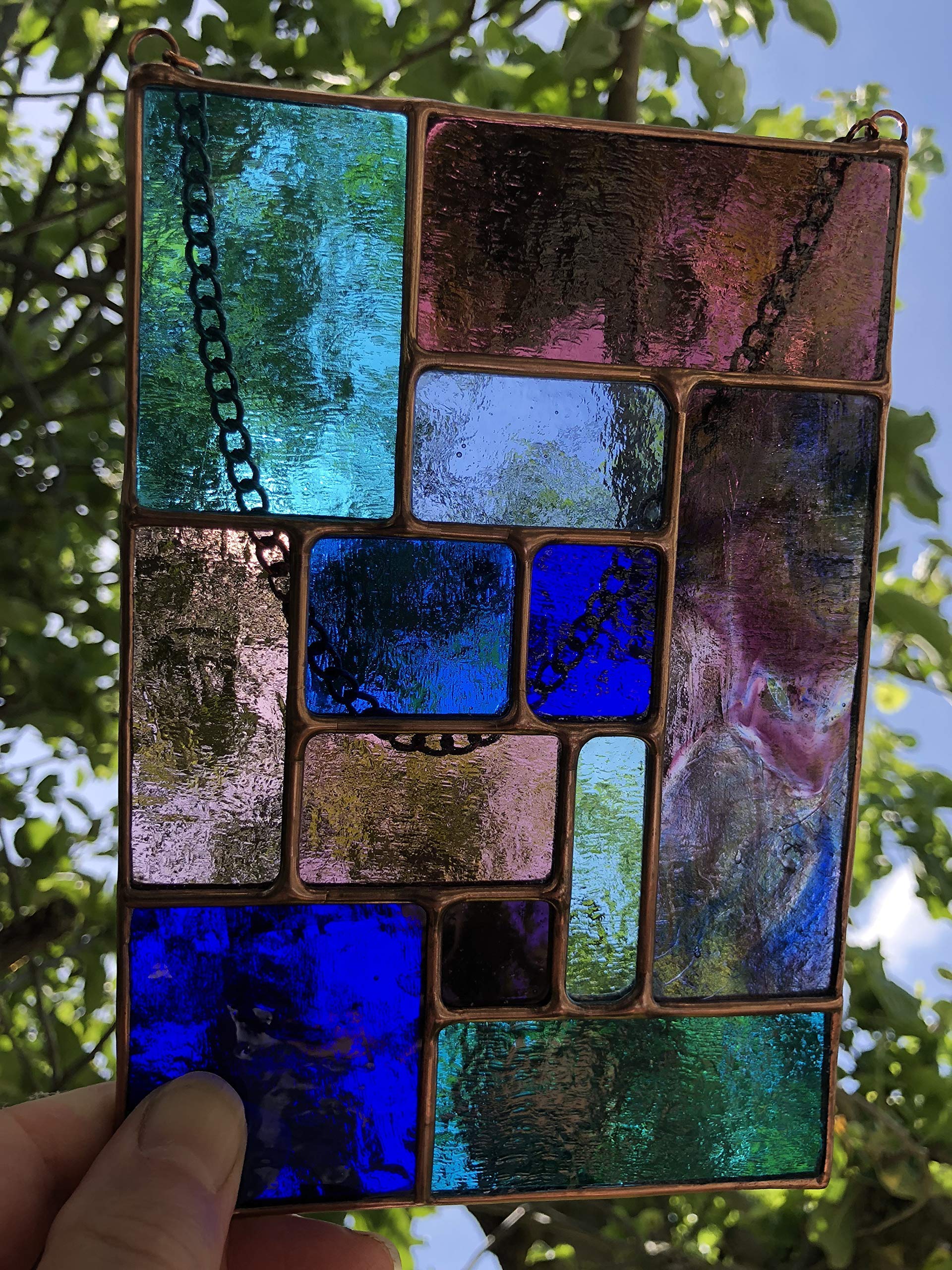 Pannello acchiappasole in vetro colorato, blu e viola, color rame, arte astratta