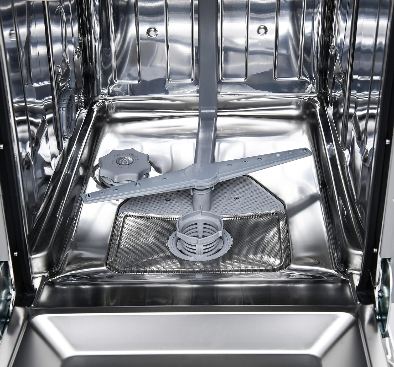 Close-up of the detergent and rinse aid dispenser inside the dishwasher door.