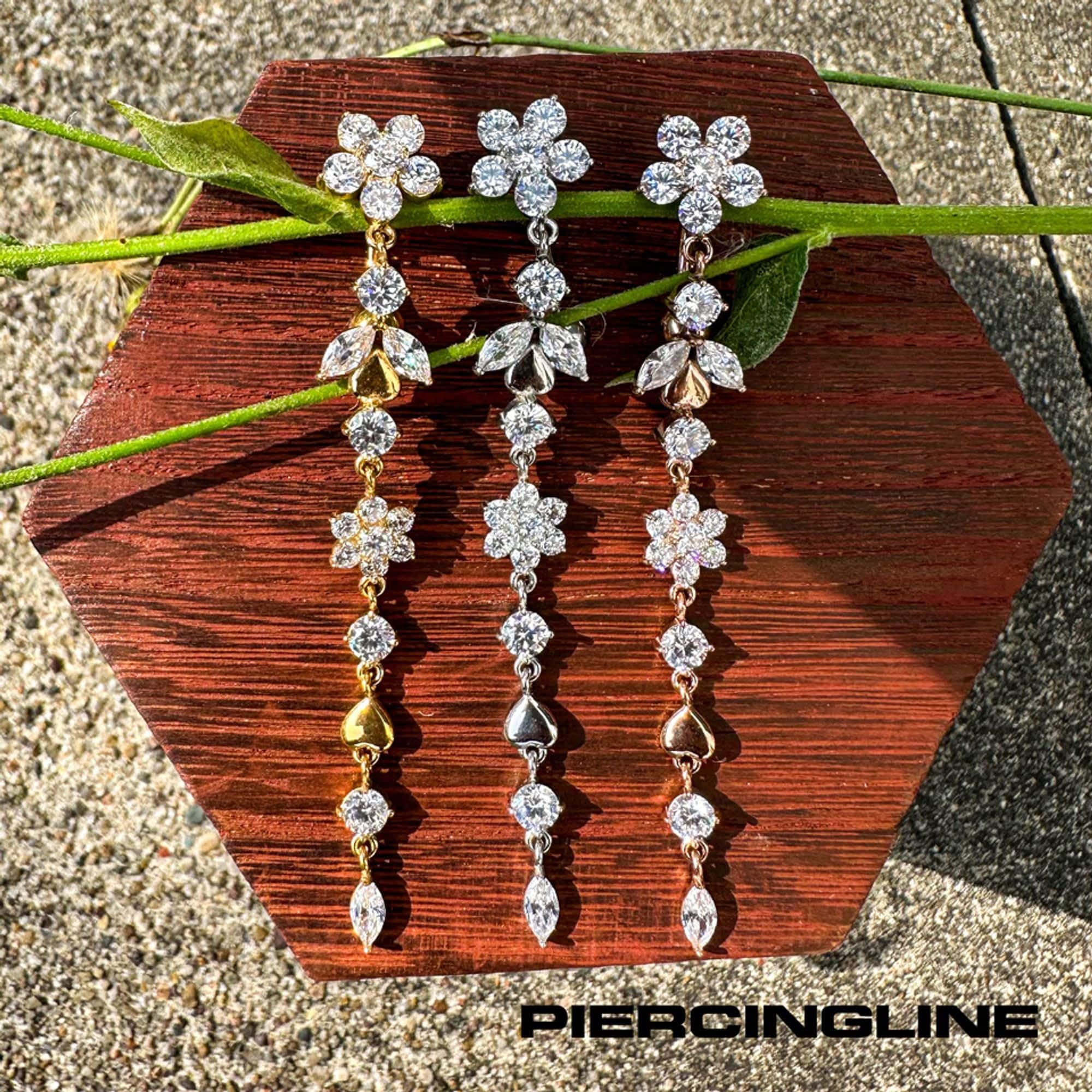 PIERCINGLINE Bauchnabelpiercing aus Chirurgenstahl mit Blumenranke - Bananabell Piercing in 3 stylischen Farben