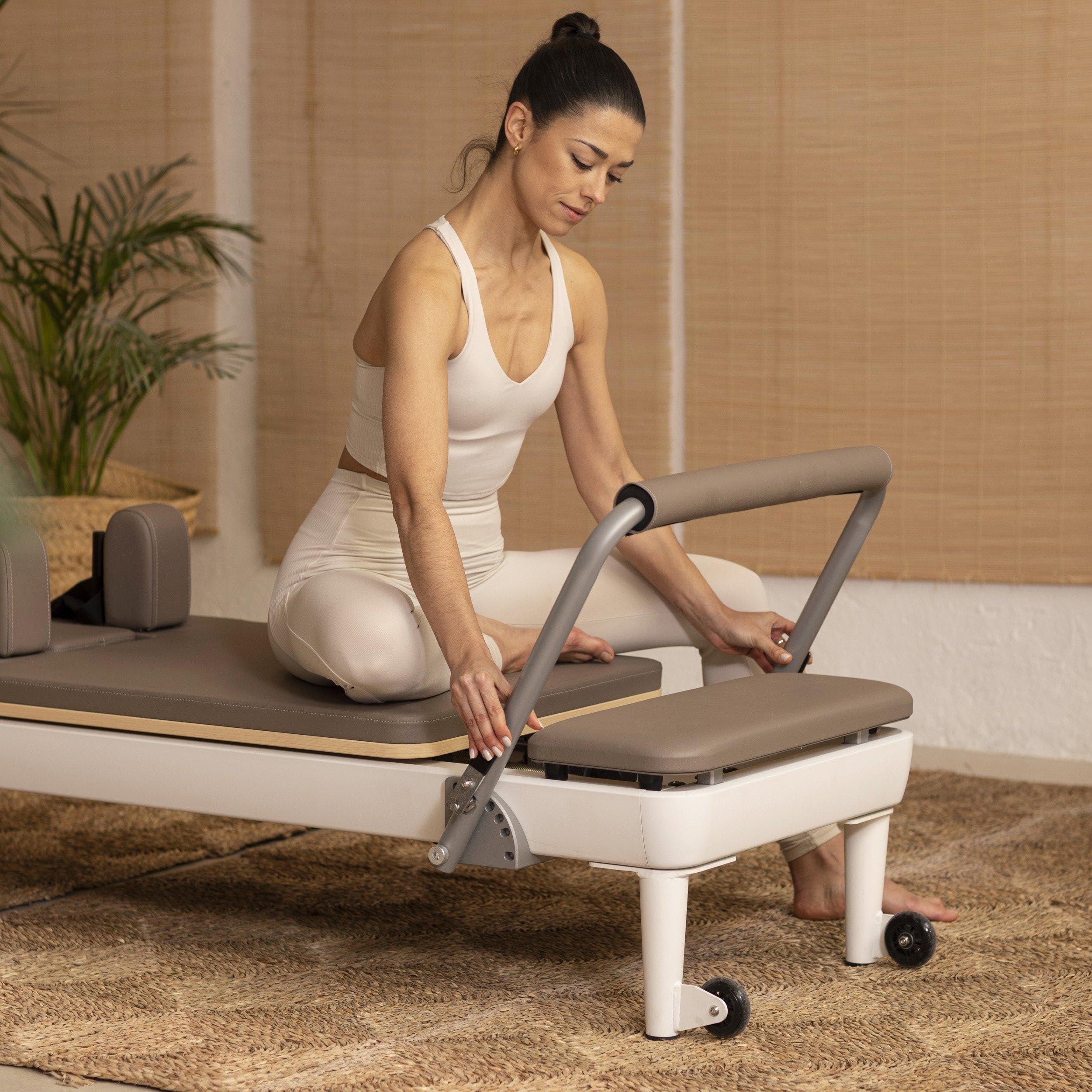 Reformer Nubium, Alluminio Bianco, pedana con sgancio rapido, Carrello Ultra-Silenzioso, Include Box e pedana per Saltare.
