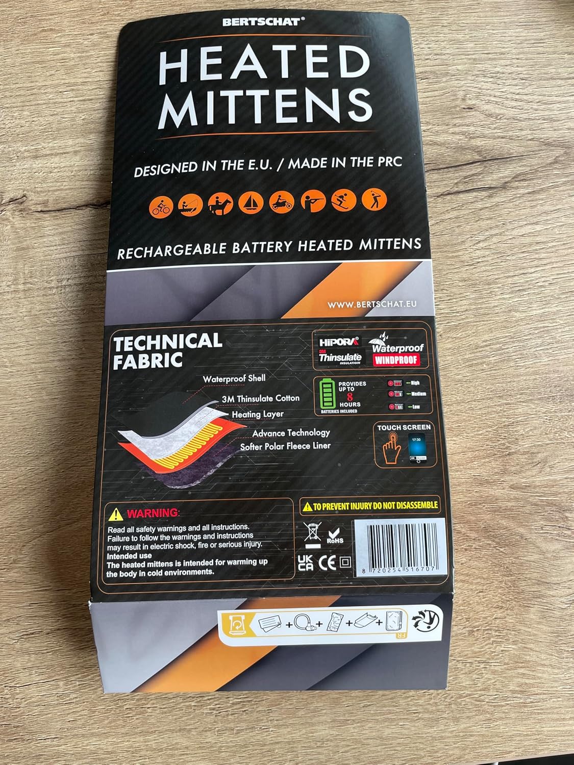 BERTSCHAT Heated Mittens packaging showing technical fabric layers and features.
