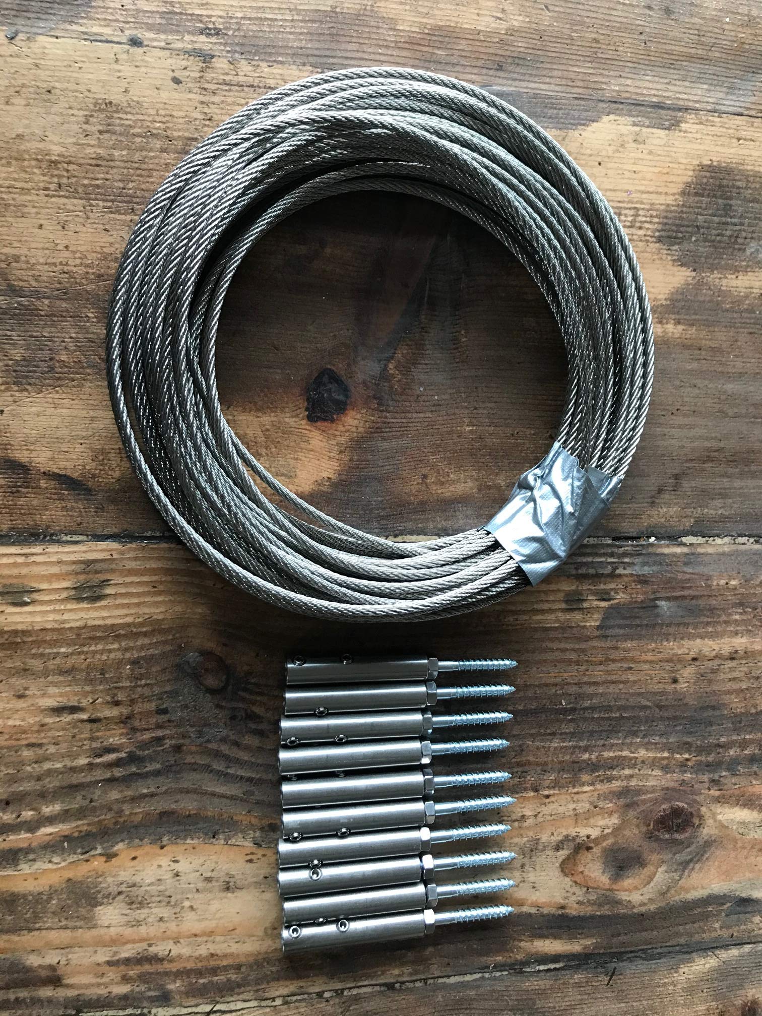 Pack de 20 m de cable de acero inoxidable de 4 mm de diámetro y 10 tensores de madera