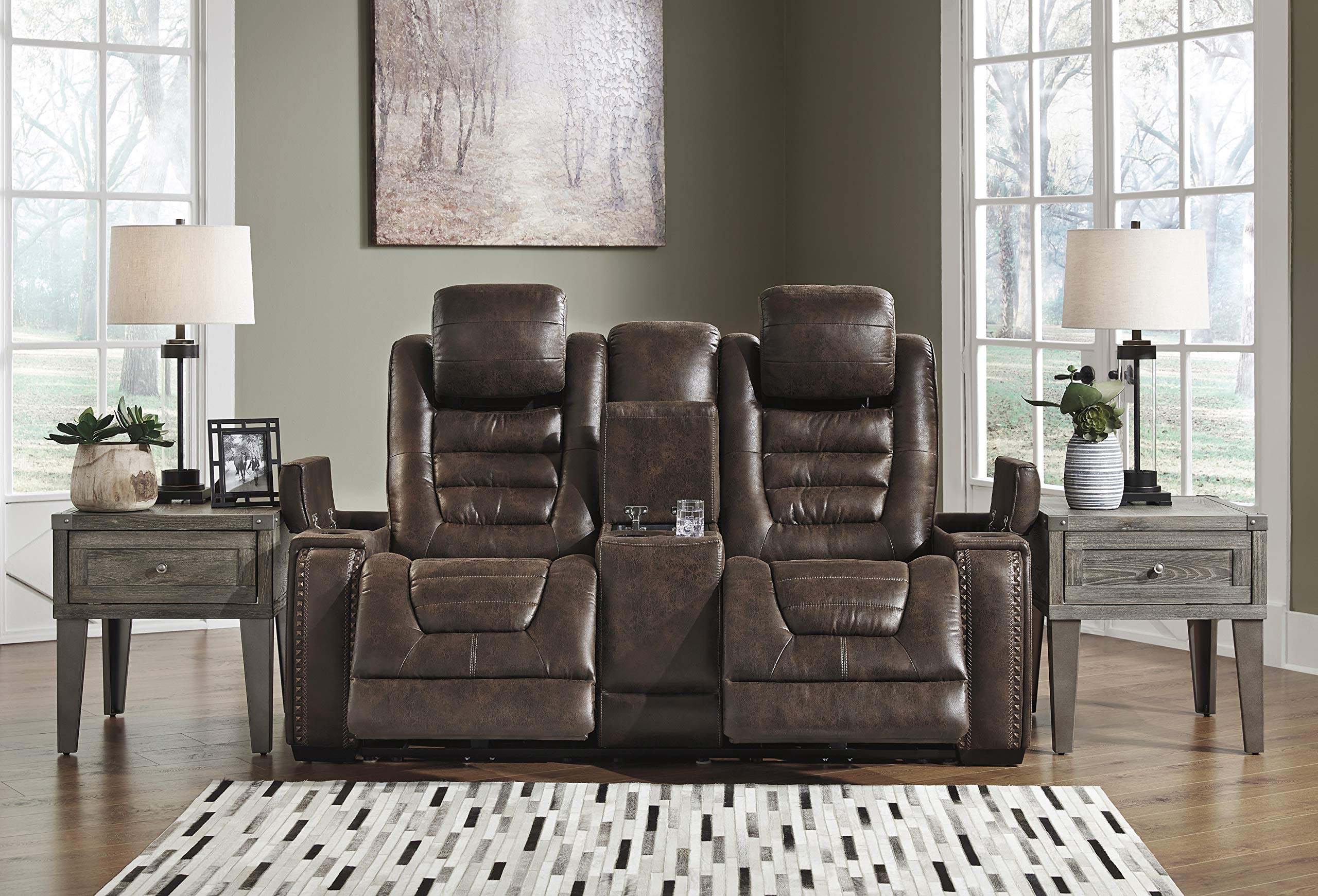 Signature Design by Ashley Game Zone Faux Leather Power Reclining Loveseat with Center Console, Brown. item is in great condition 
