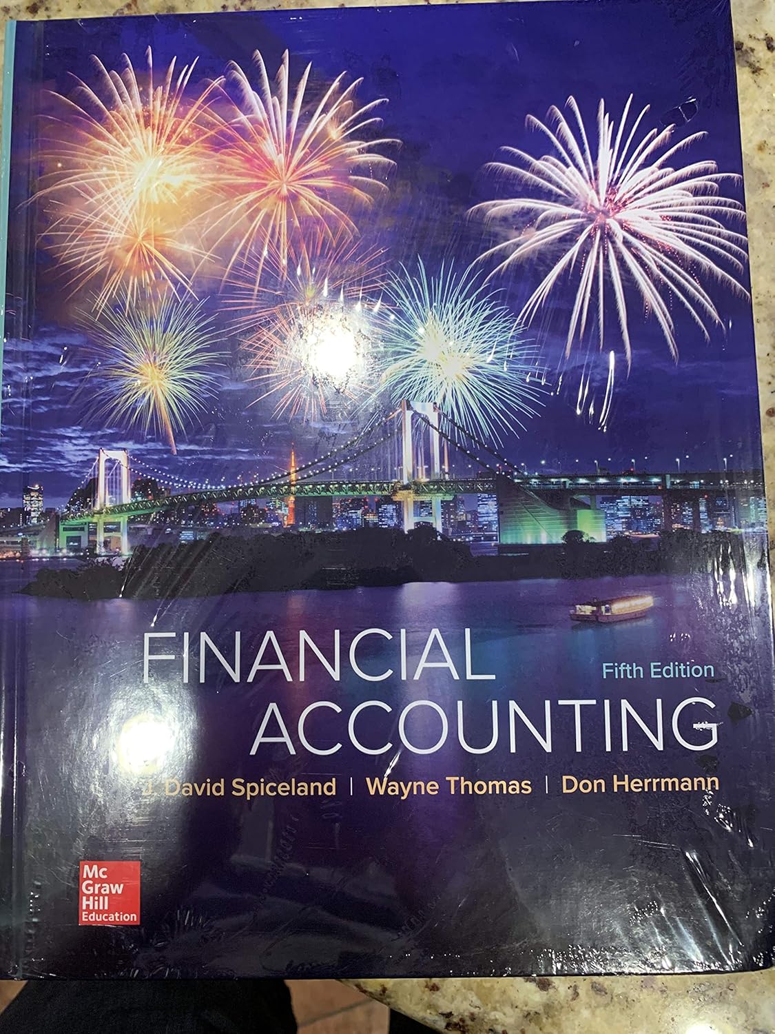 Financial Accounting Spiceland, David, Thomas, Wayne M., Herrmann, Don