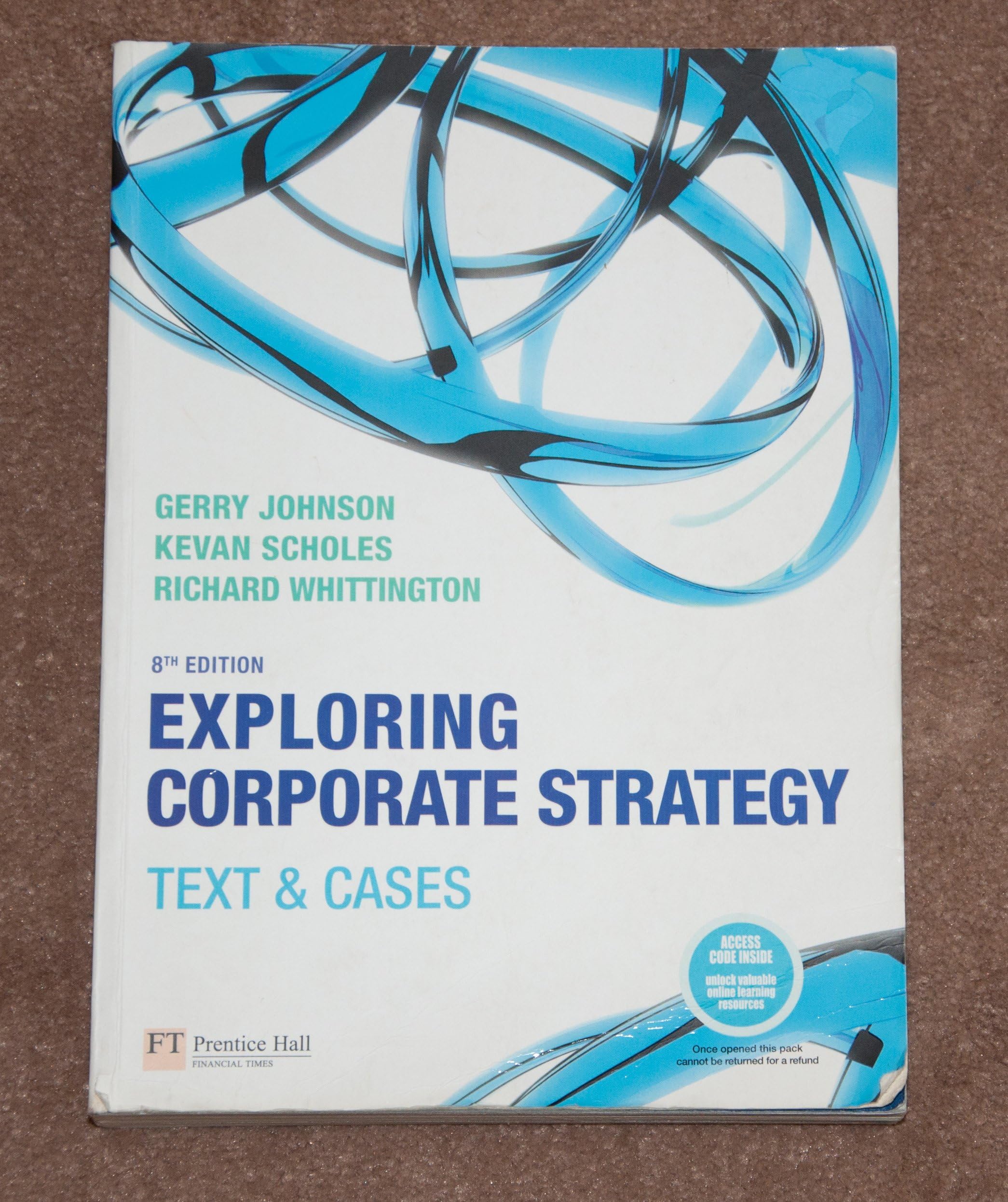 Exploring Corporate Strategy: Text & Cases Paperback – 7 Dec. 2007