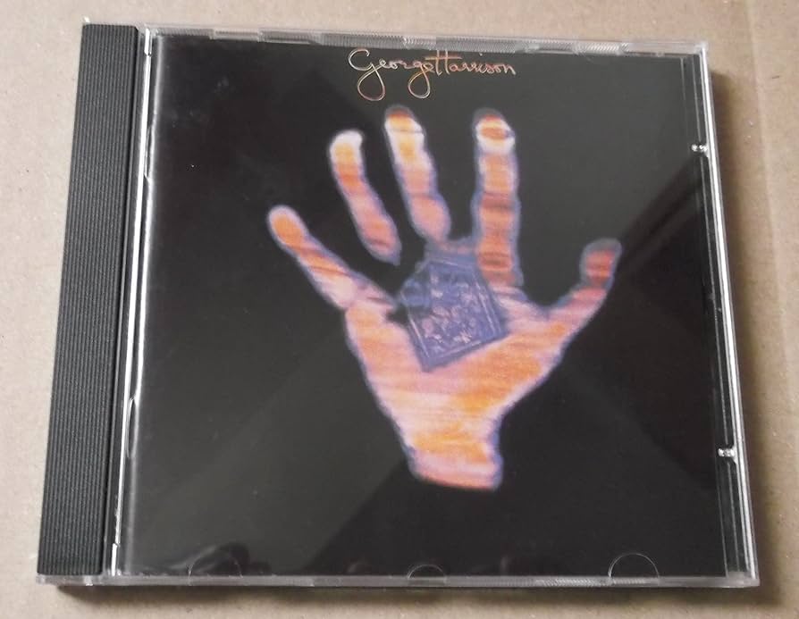 Amazon.co.jp: Living in the Material World: ミュージック