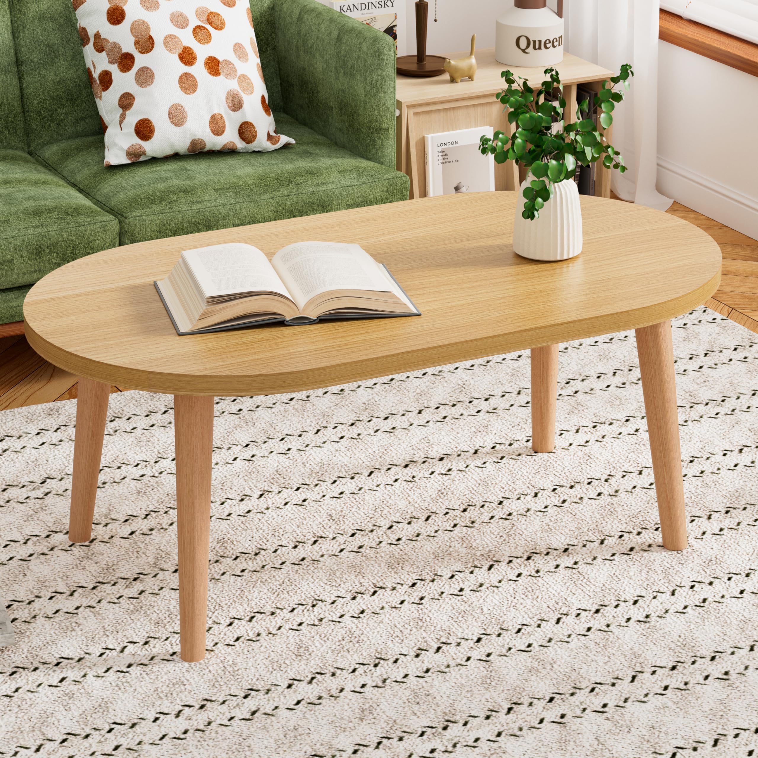 FAMIDGE low oval coffee table with solid wood legs for floor seating style