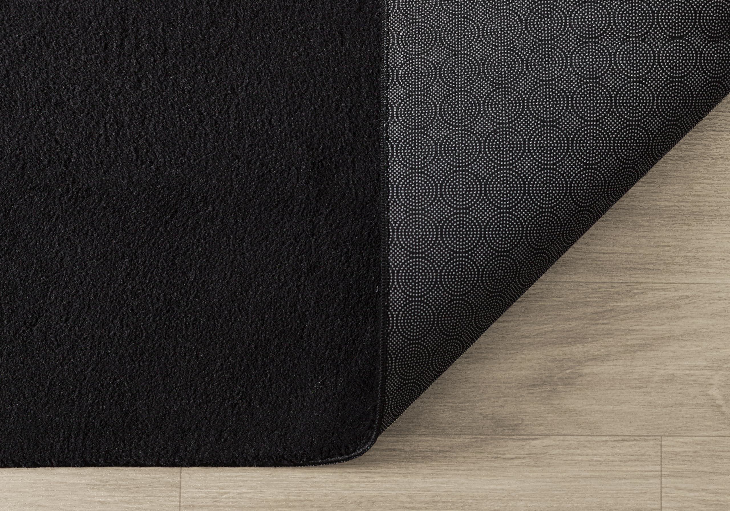 Mia's Teppiche Comfort Tappeto moderno a pelo corto, lato inferiore antiscivolo, lavabile fino a 30 gradi, morbidissimo, effetto pelliccia, Nero, 60 x 110 cm