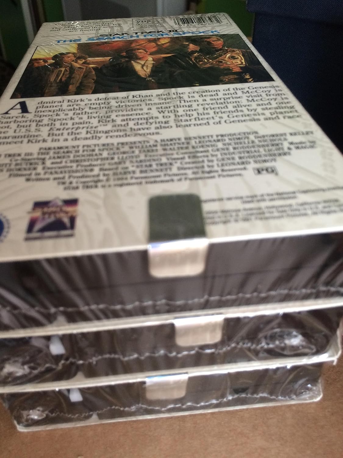 Star Trek. The Movies. 25th Anniversary Collection. 1991. 5 Videotapes in Cloth box with 5 VHS tapes in VHS boxes with pins. Includes Star Trek, The Motion Picture, The Wrath of Khan, The Search for Spock, The Voyage Home and The Final Frontier.