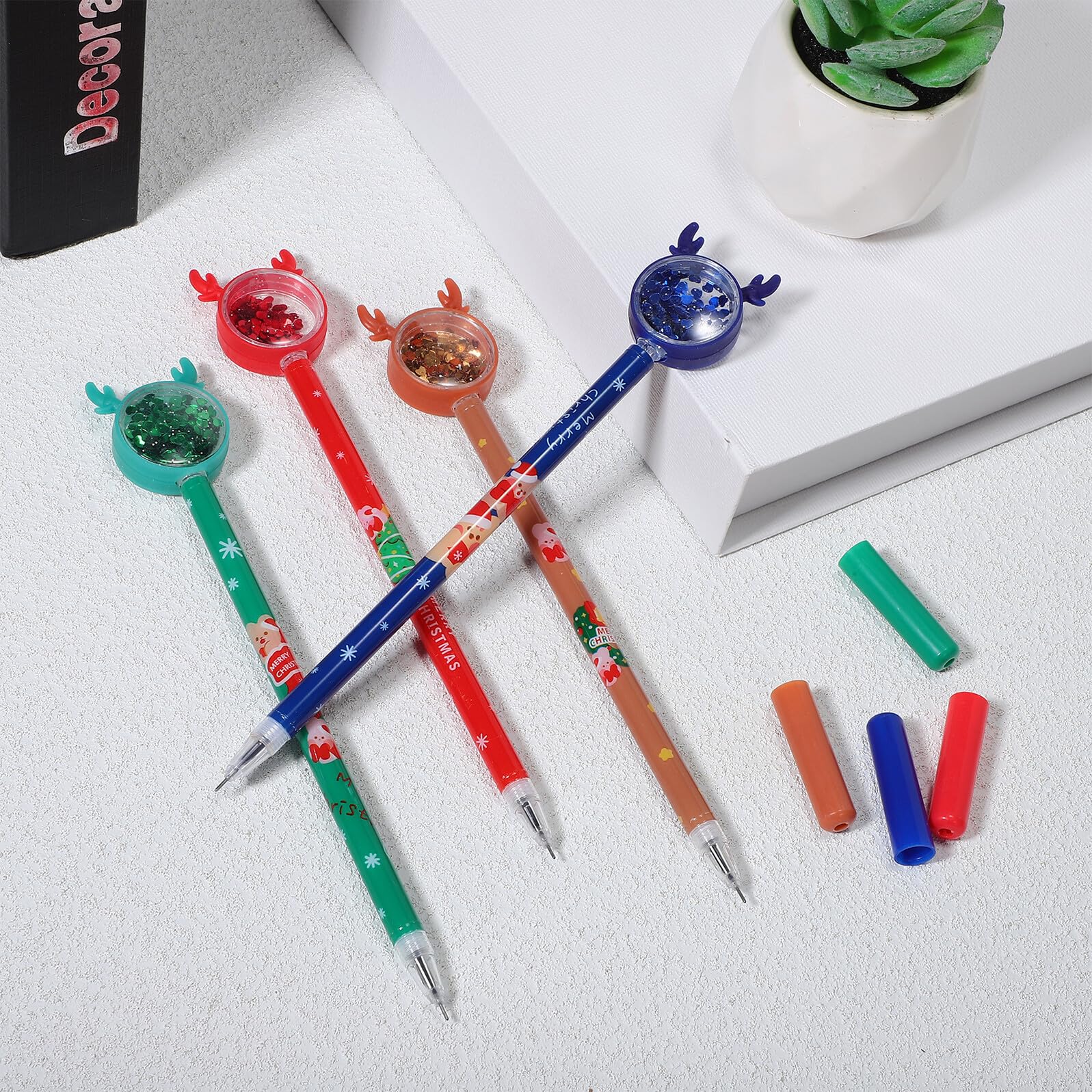 WOONEKY 36 Pièces Lot de Stylos Gel à Encre Fluide Thème Noël avec Toppers Renne Paillettes pour Écriture Lisse et Cadeaux Festifs
