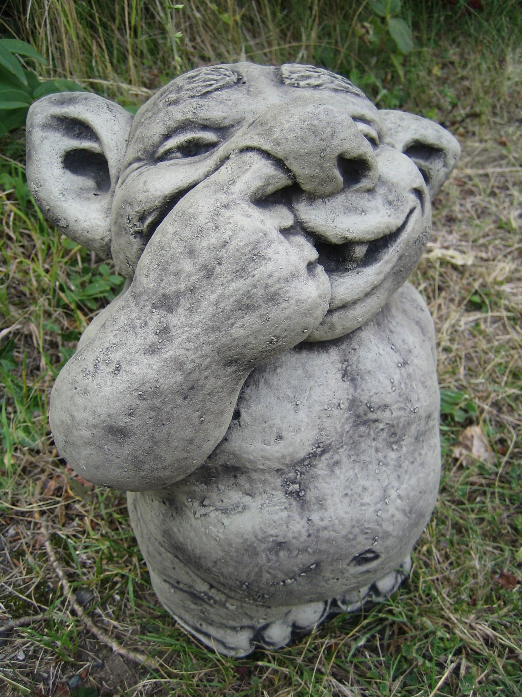 Nose picking troll stone garden ornament