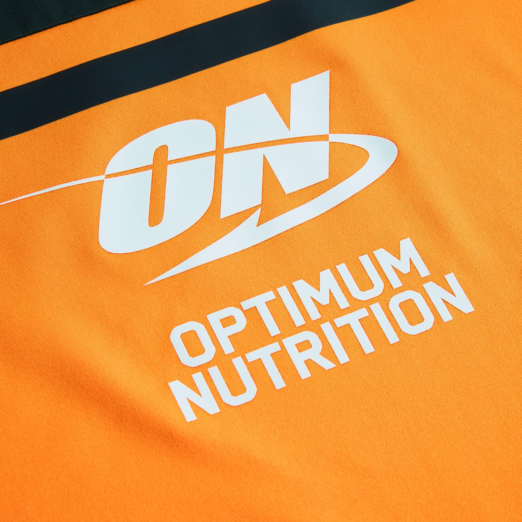 PUMA McLaren F1 2026 Damen Team T-Shirt - Orange | Mit allen neuesten McLaren Formel-1-Team- und Partnerlogos, Offizielle lizenzierte Replica-Sammlung