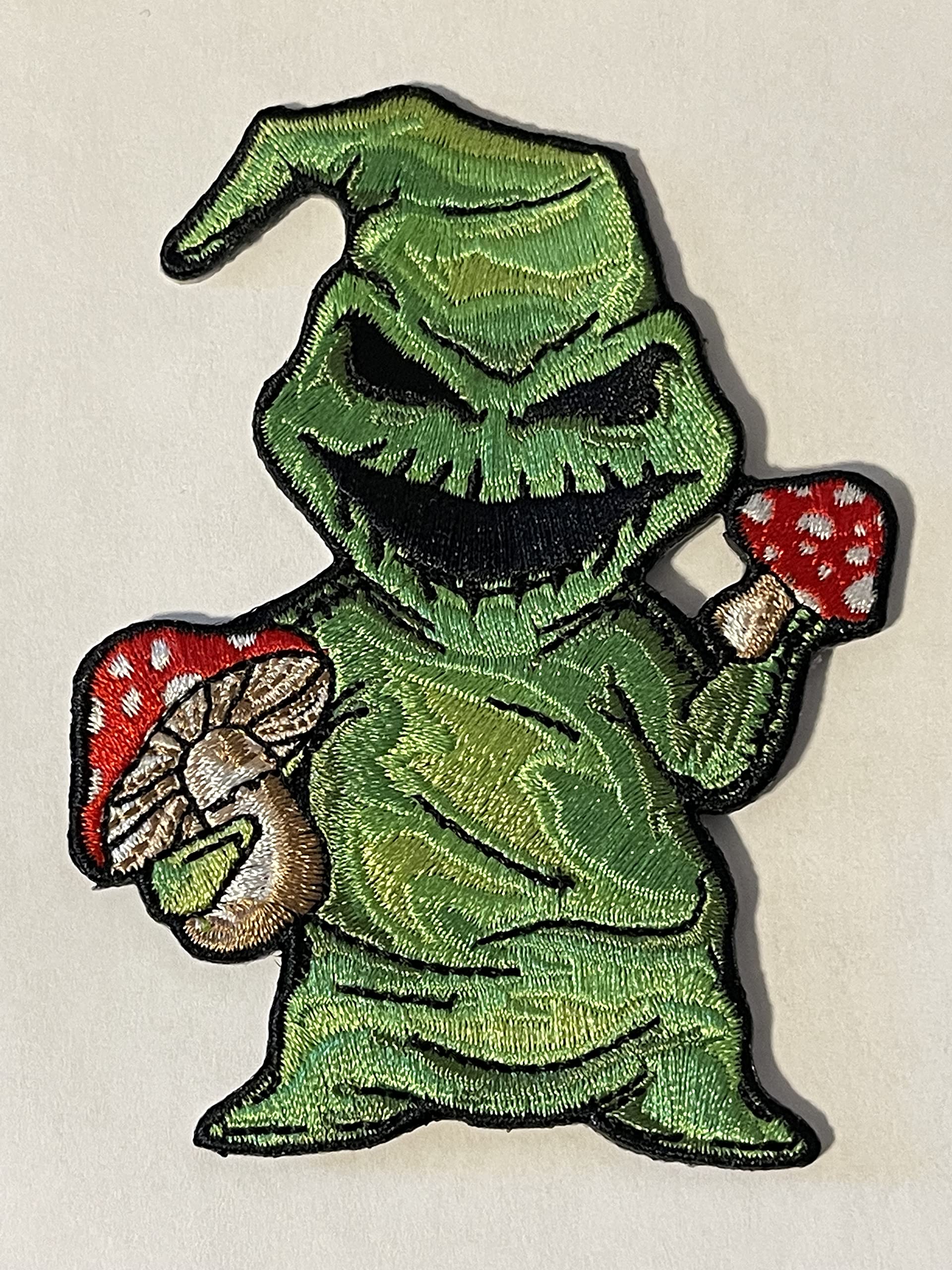 “Green Monster Iron On Patch – Creepy Sack Figure Holding Mushrooms Embroidered Applique for Jackets, Bags, Costumes”