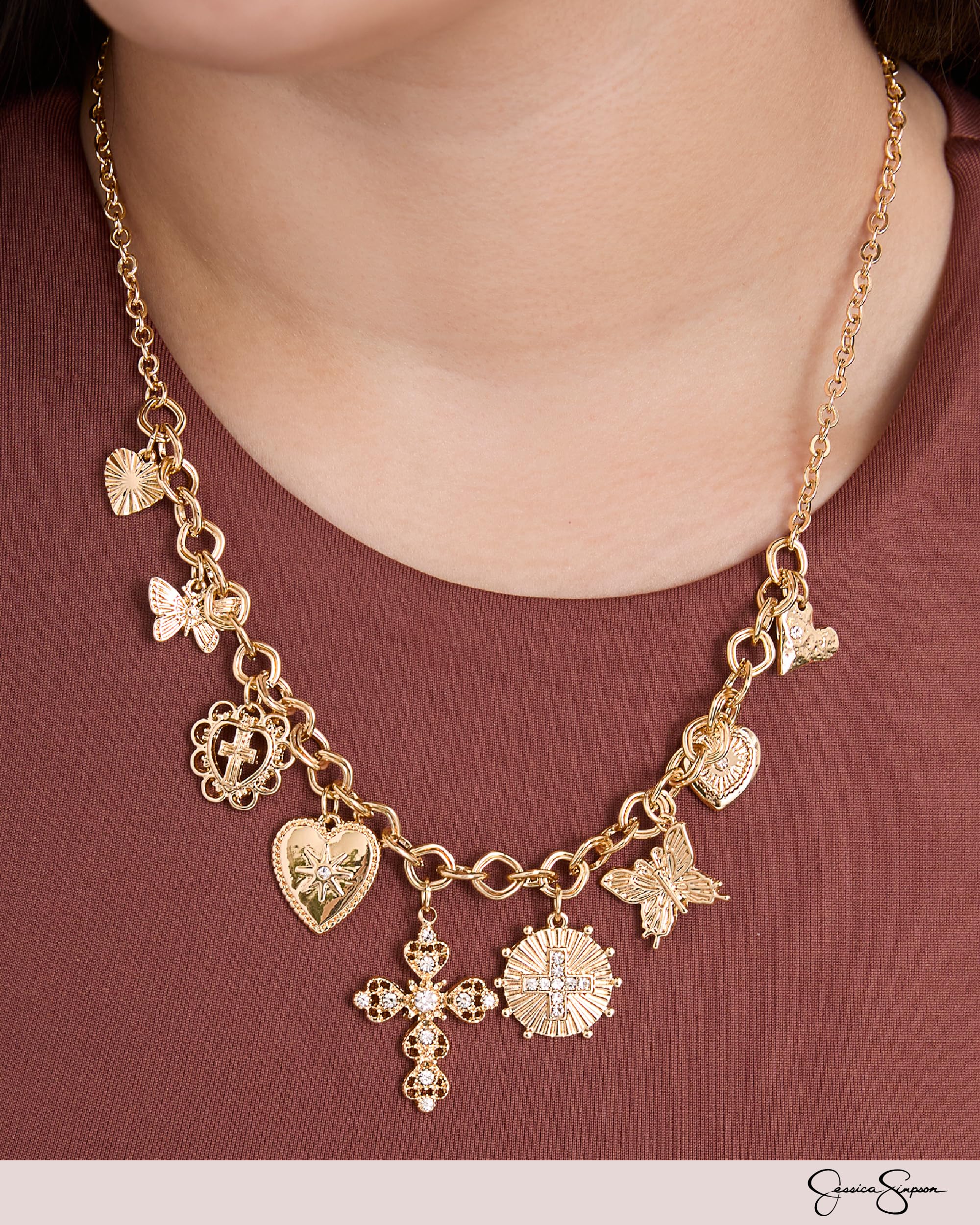 Jessica Simpson Gold-Tone Charm Necklace for Women 18"+3" with Butterfly, Cross, and Heart Charms