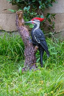 Pileated Woodpecker on a Tree Trunk Garden Statue