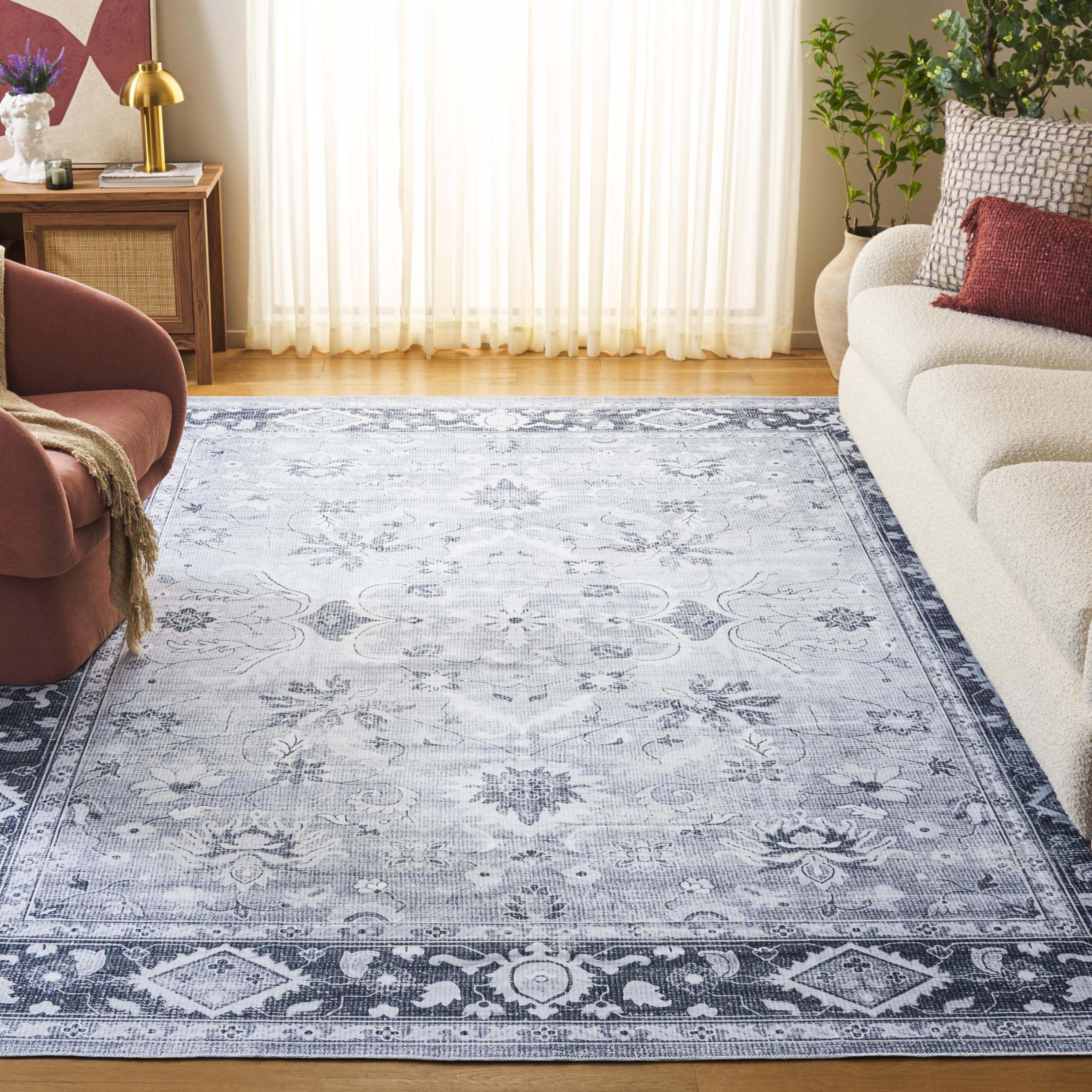 Tapis de sol vieilli Safavieh en gris et ivoire pour un salon chic